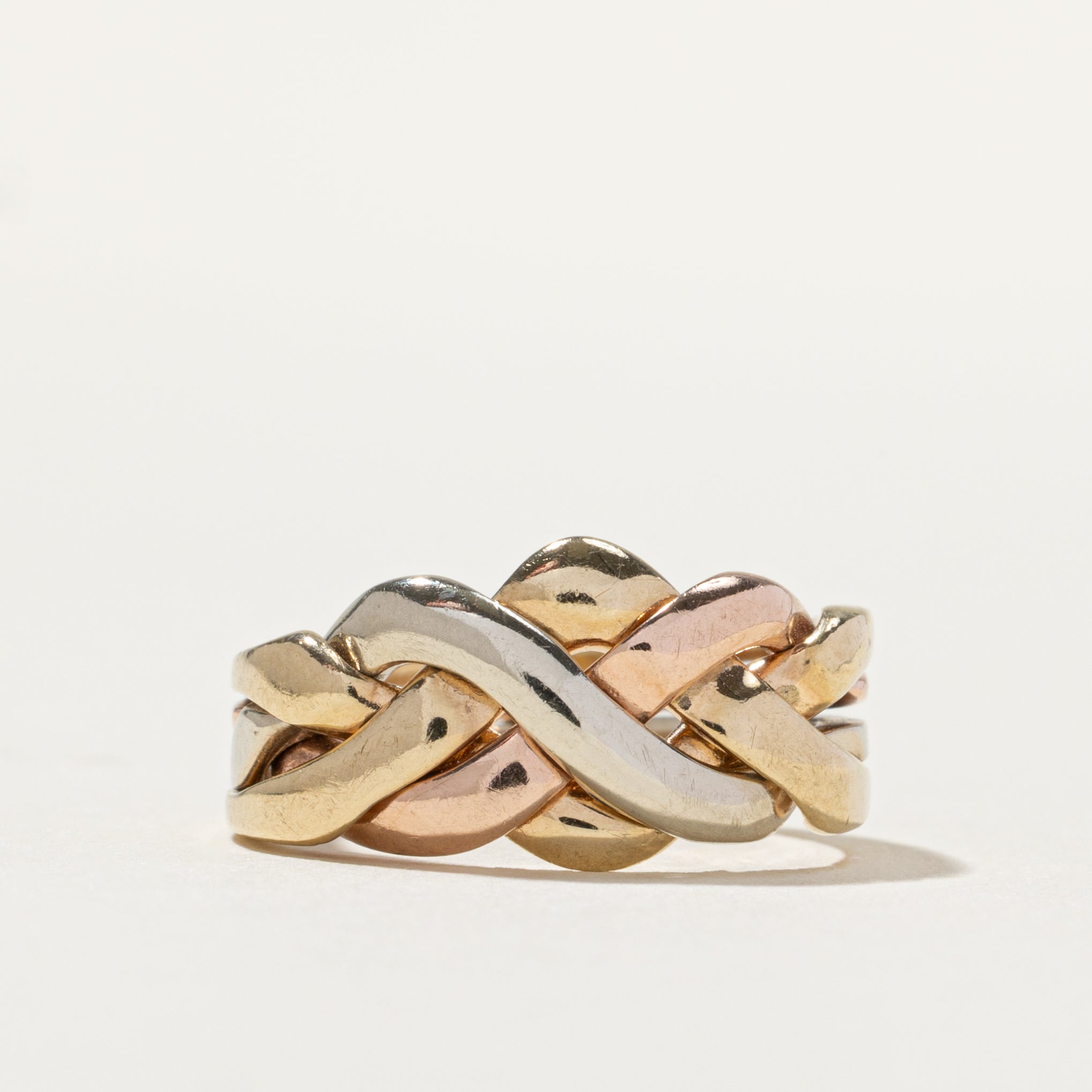 Bague puzzle italienne en or tricolore 9 carats | Taille 4,5