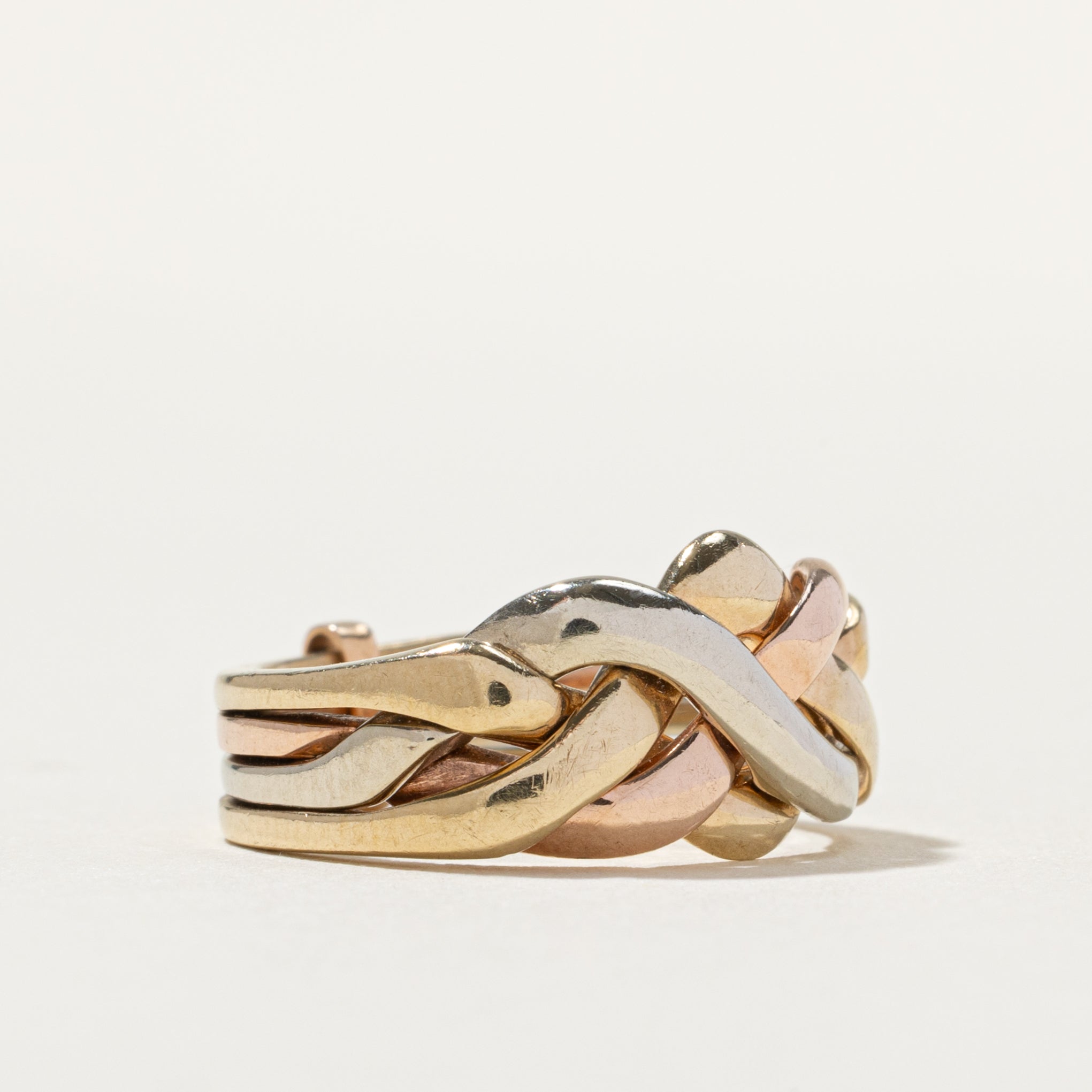 Bague puzzle italienne en or tricolore 9 carats | Taille 4,5