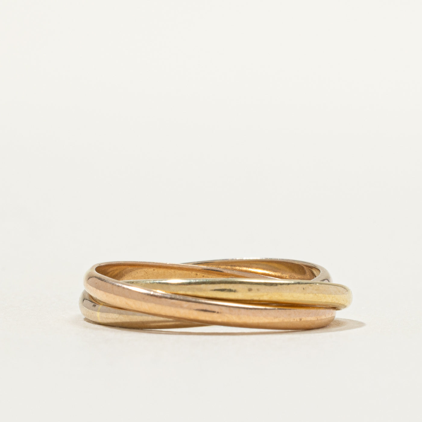 Bague entrelacée en or tricolore 18 carats | Taille 5,25