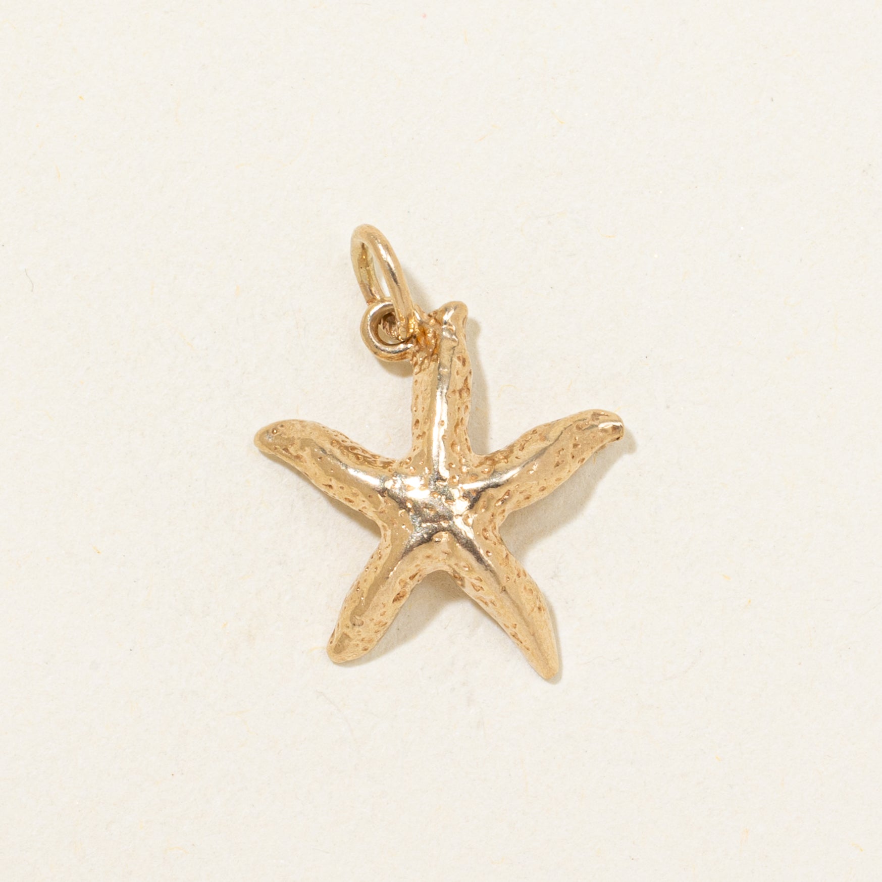 Breloque étoile de mer en or jaune 10 carats