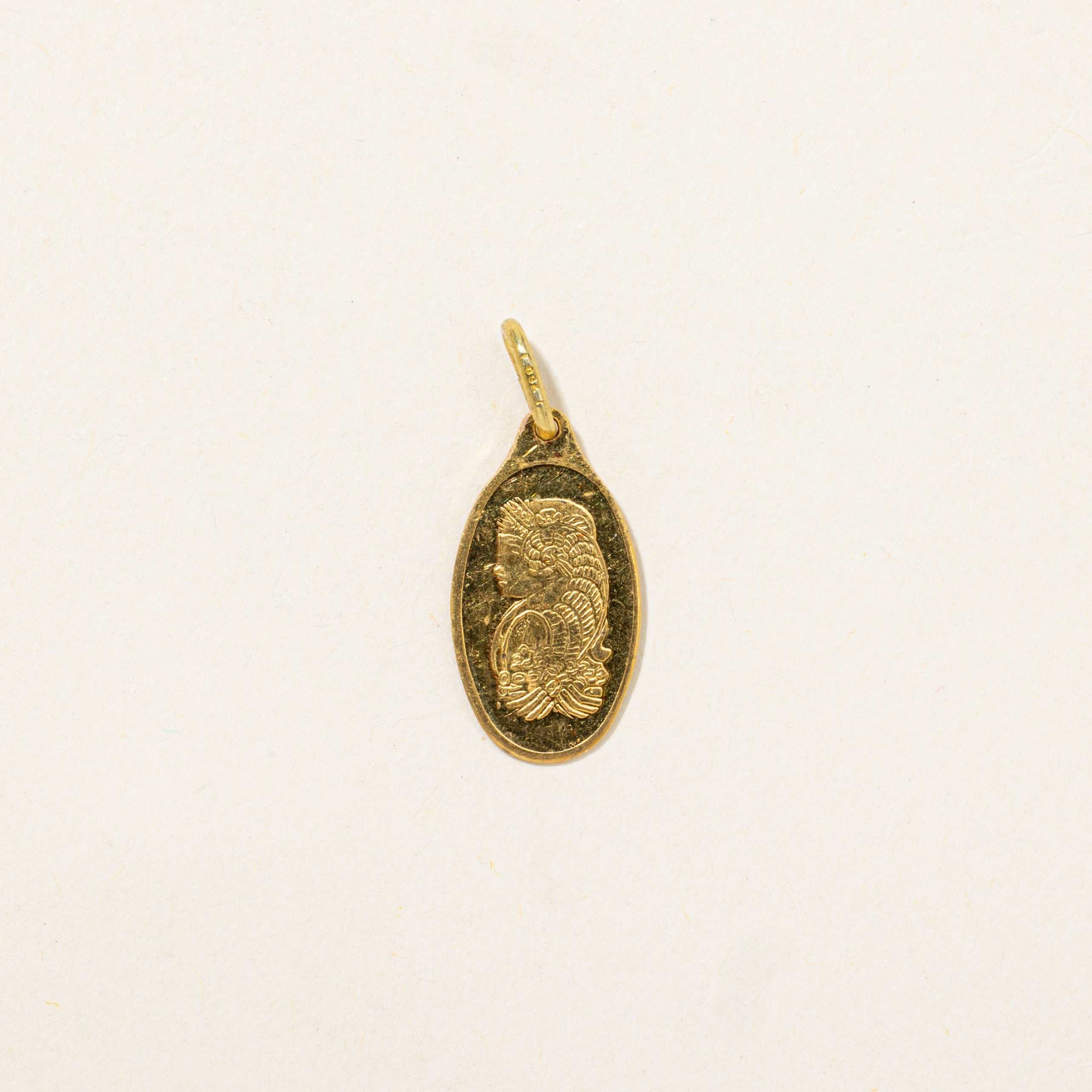 Breloque suisse en or jaune 24 carats (1 gramme)