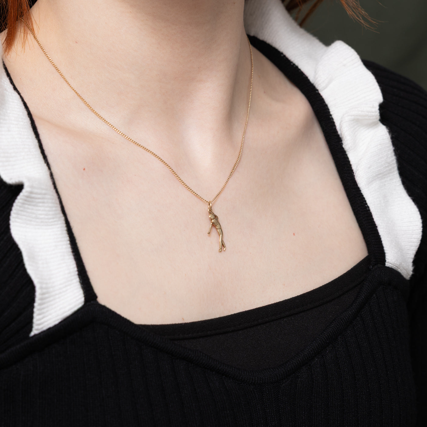 Breloque golfeur en or jaune 10 carats