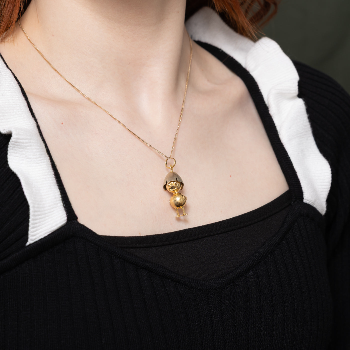 Breloque poussin en or bicolore 18 carats