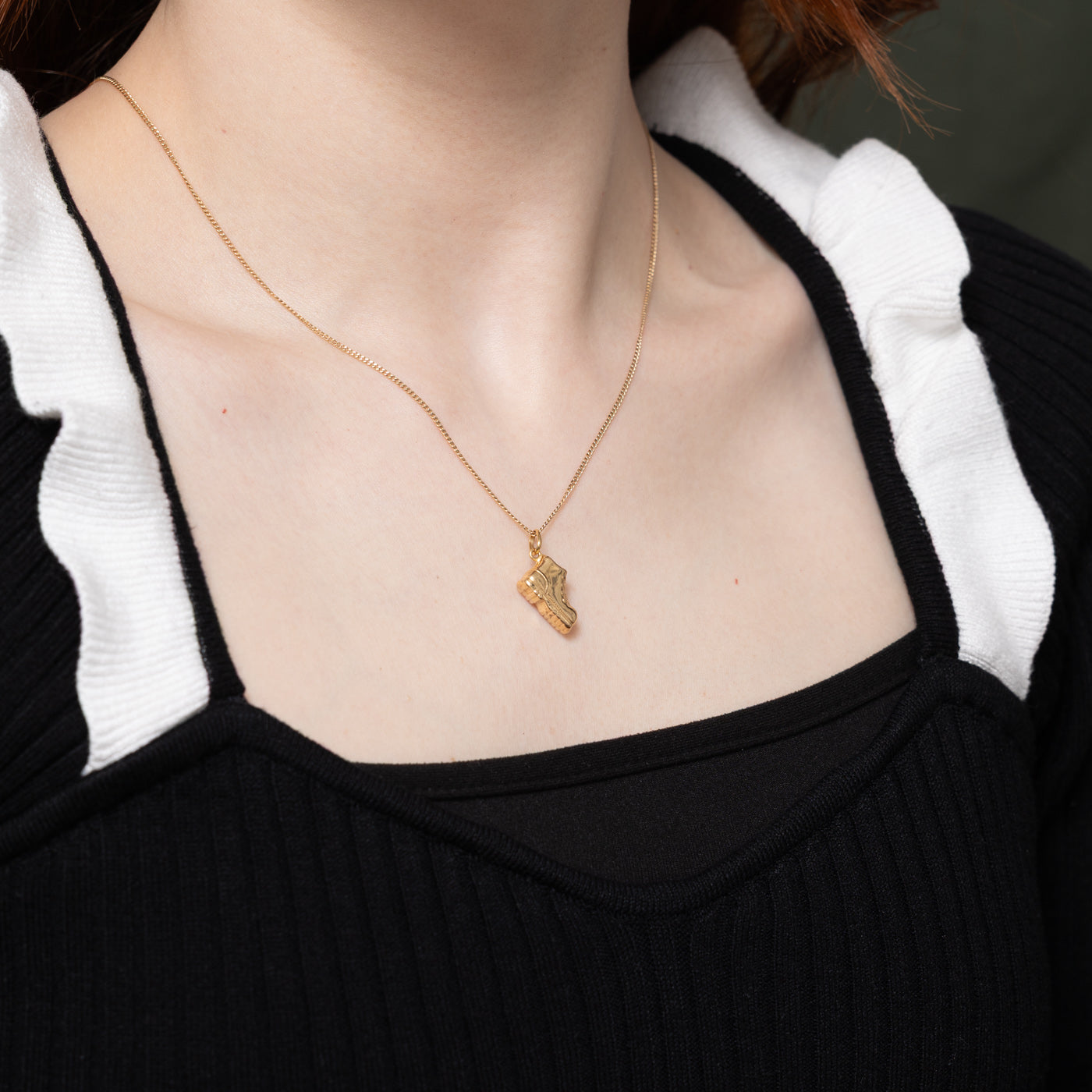 Breloque botte en or jaune 18 carats