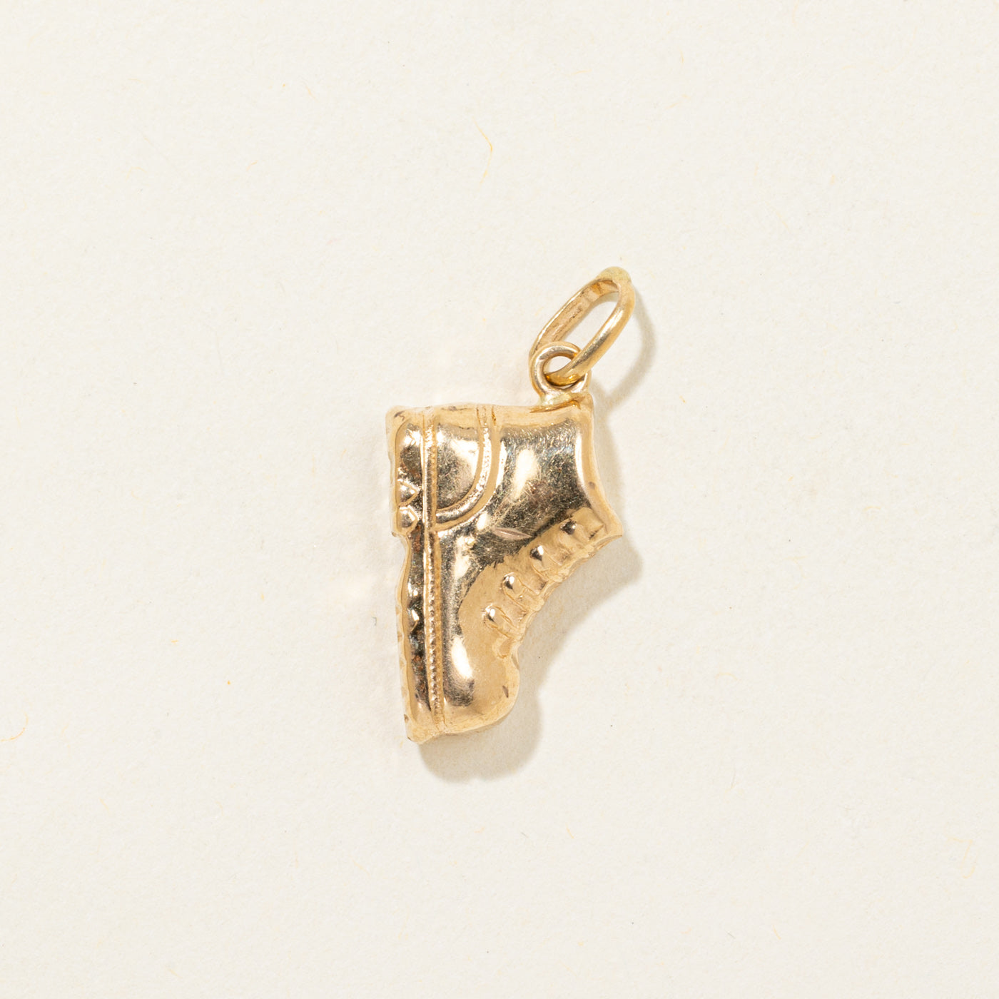 Breloque botte en or jaune 18 carats