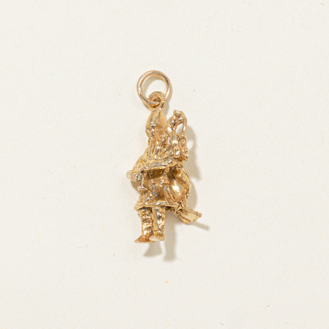 Breloque de joueur de cornemuse 9K