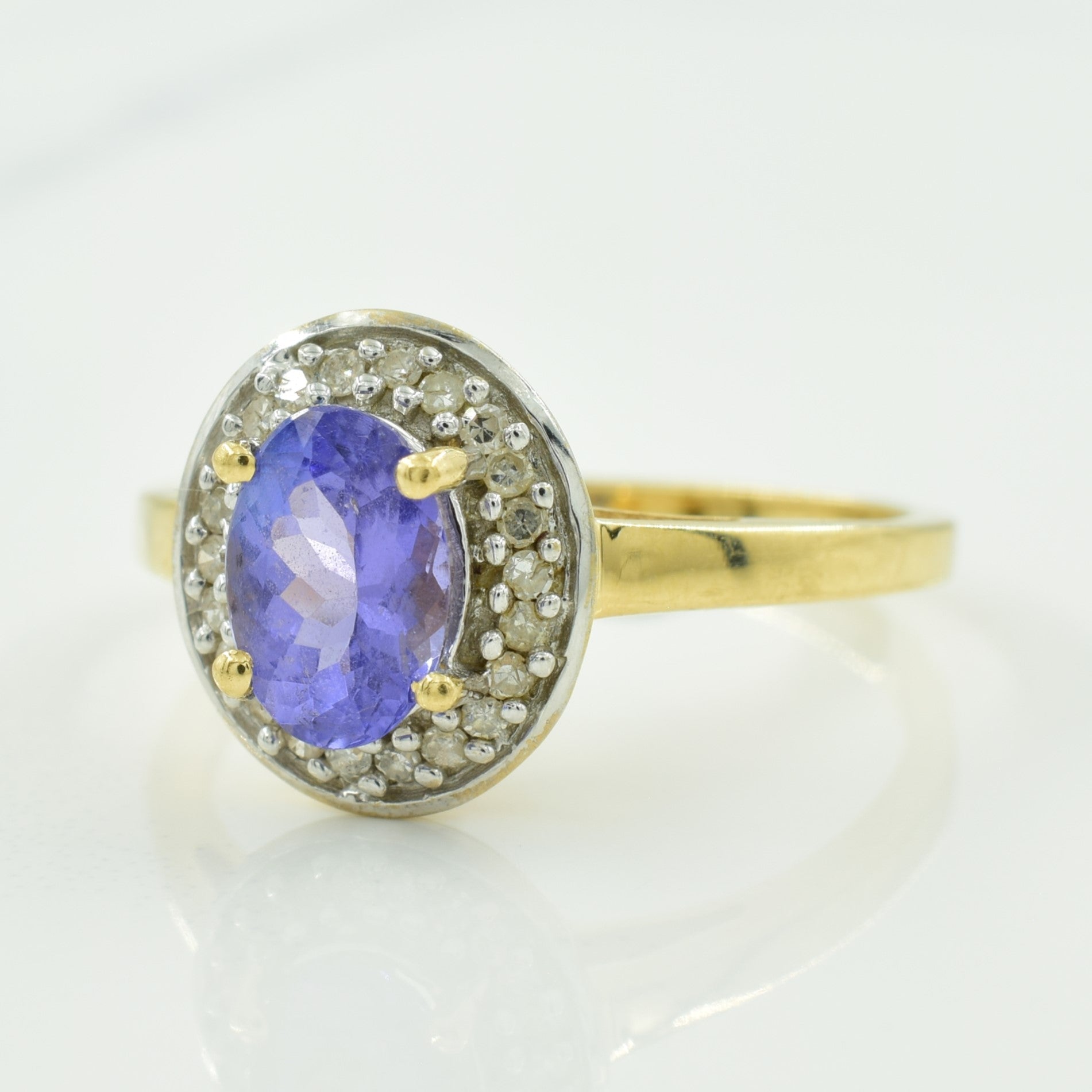 Tanzanite & Diamond Halo Ring | 0.90ct, 0.11ctw | SZ 7.25 |