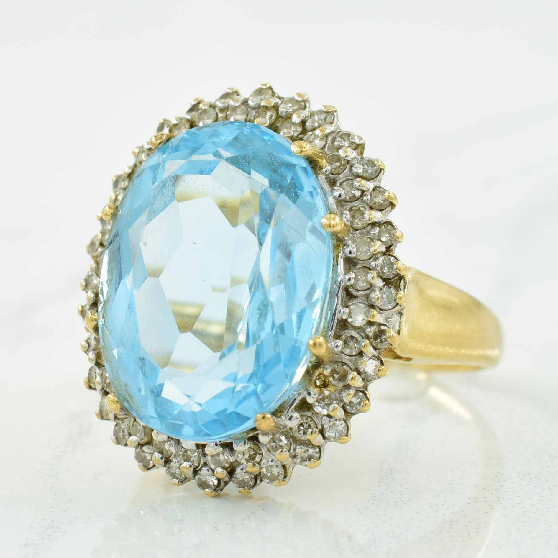 Blue Topaz & Diamond Halo Ring | 12.00ct, 0.32ctw | SZ 7 |