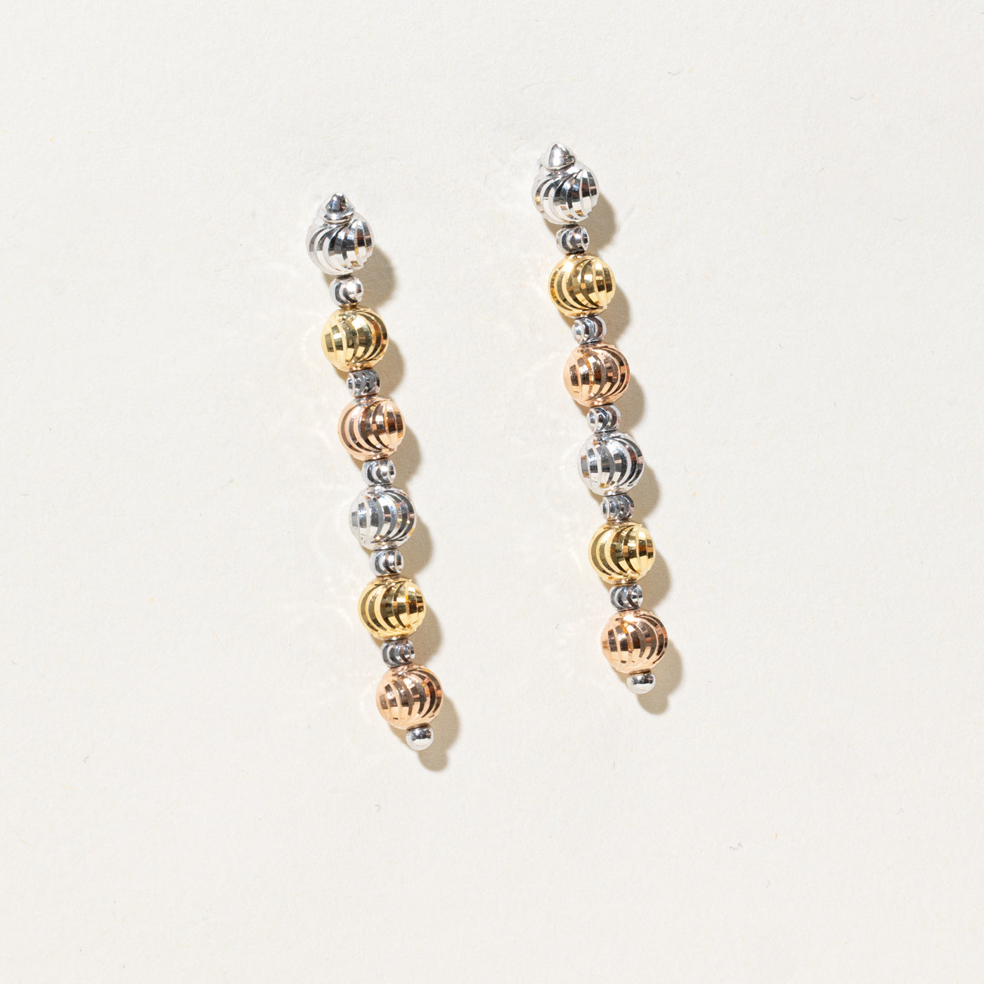 Tri Tone Gold Grooved Bead Drop Earrings