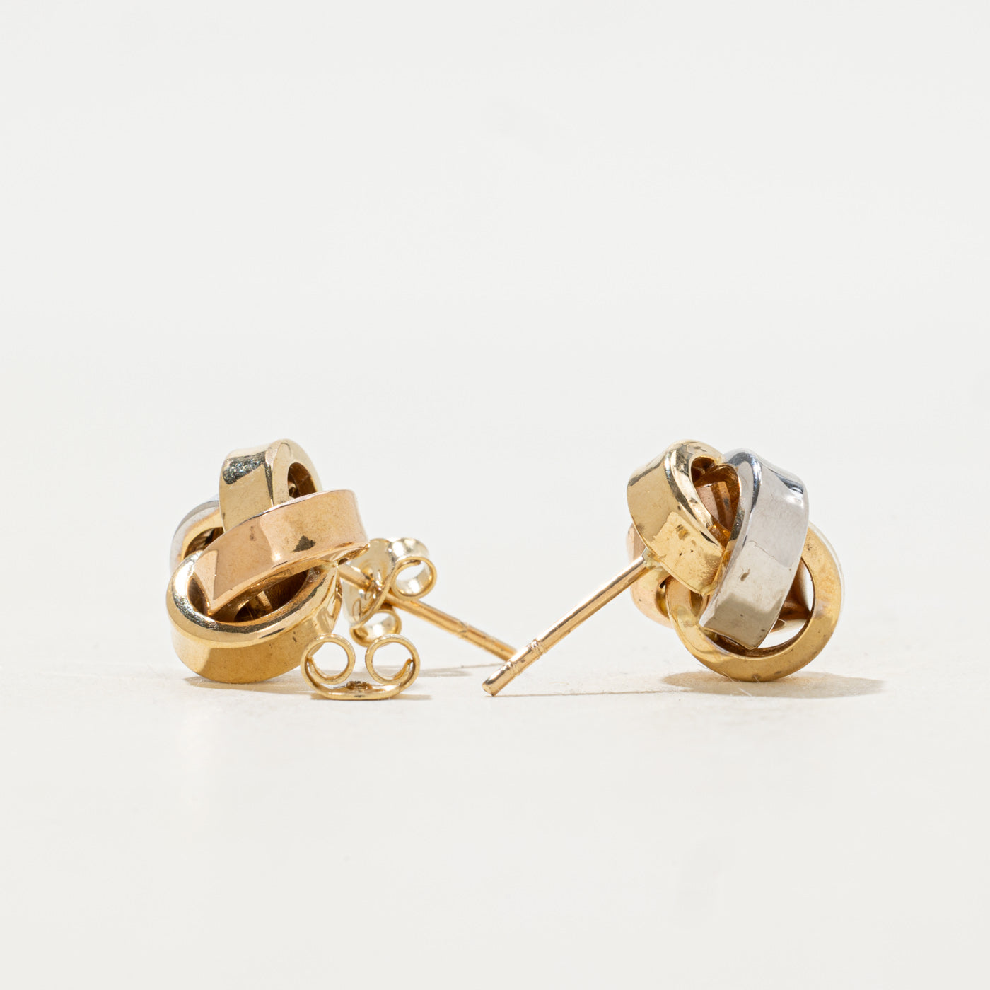 Boucles d'oreilles puces nœud tricolores en or