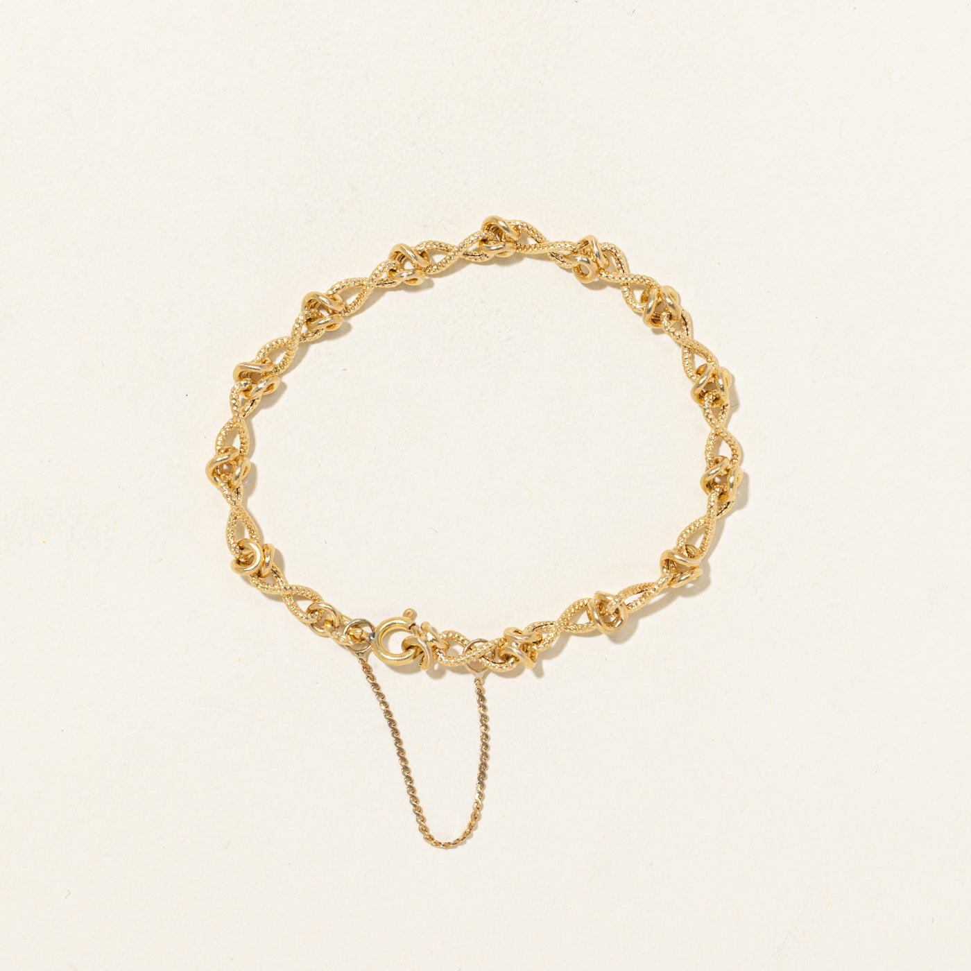 Bracelet à maillons infinis texturé en or 18 carats | 18 cm