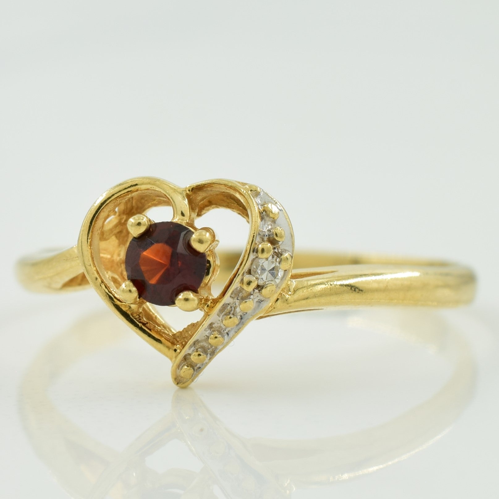 Garnet & Diamond Heart Shaped Ring | 0.12ct, 0.01ct | SZ 6.25 |