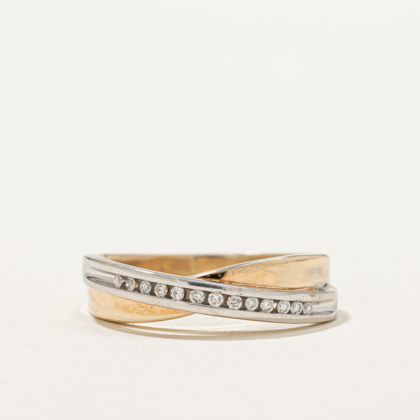 10K Semi Eternity Channel Set Diamond Cross Over Ring | 0.075ctw | SZ 7.5