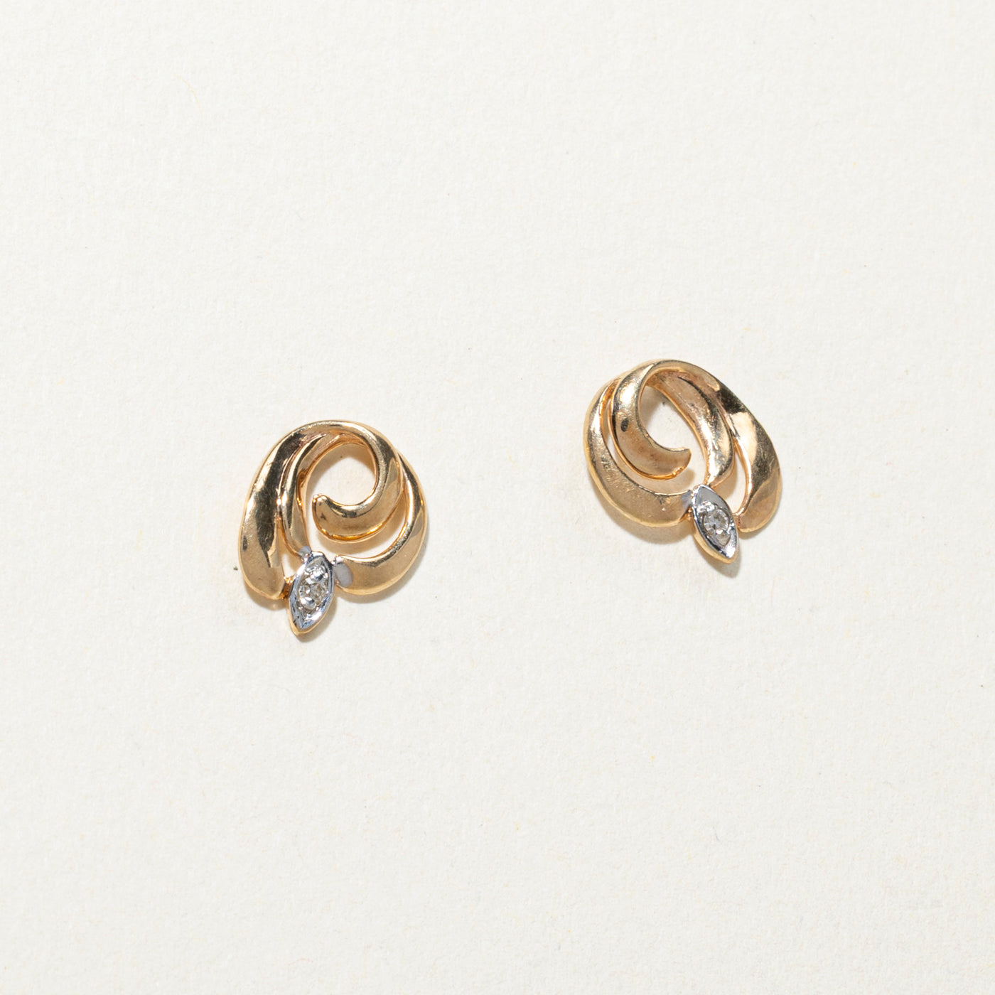 10K Diamond Swirl Stud Earrings | 0.02ctw