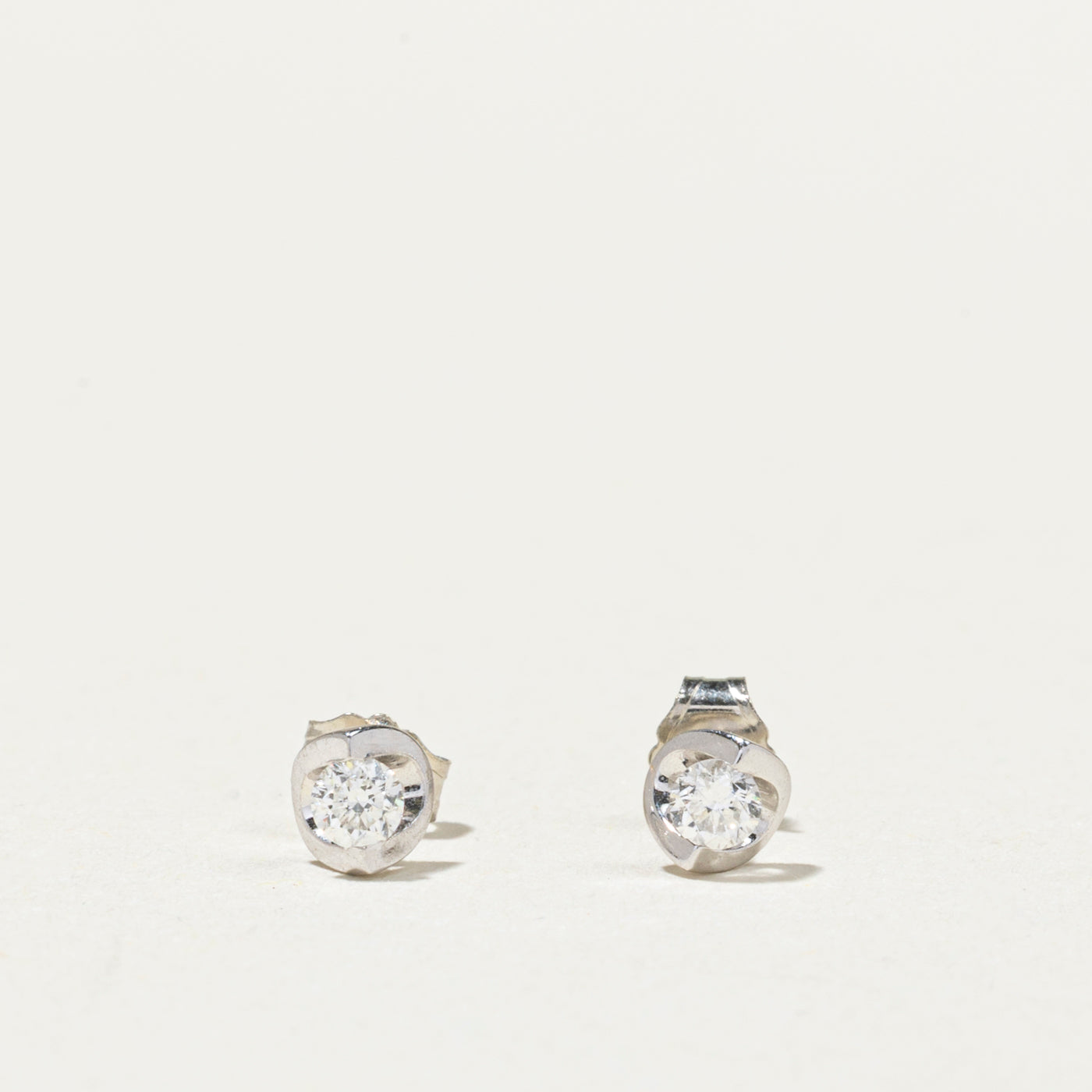 14K Tension Set Diamond Stud Earrings | 0.14ctw