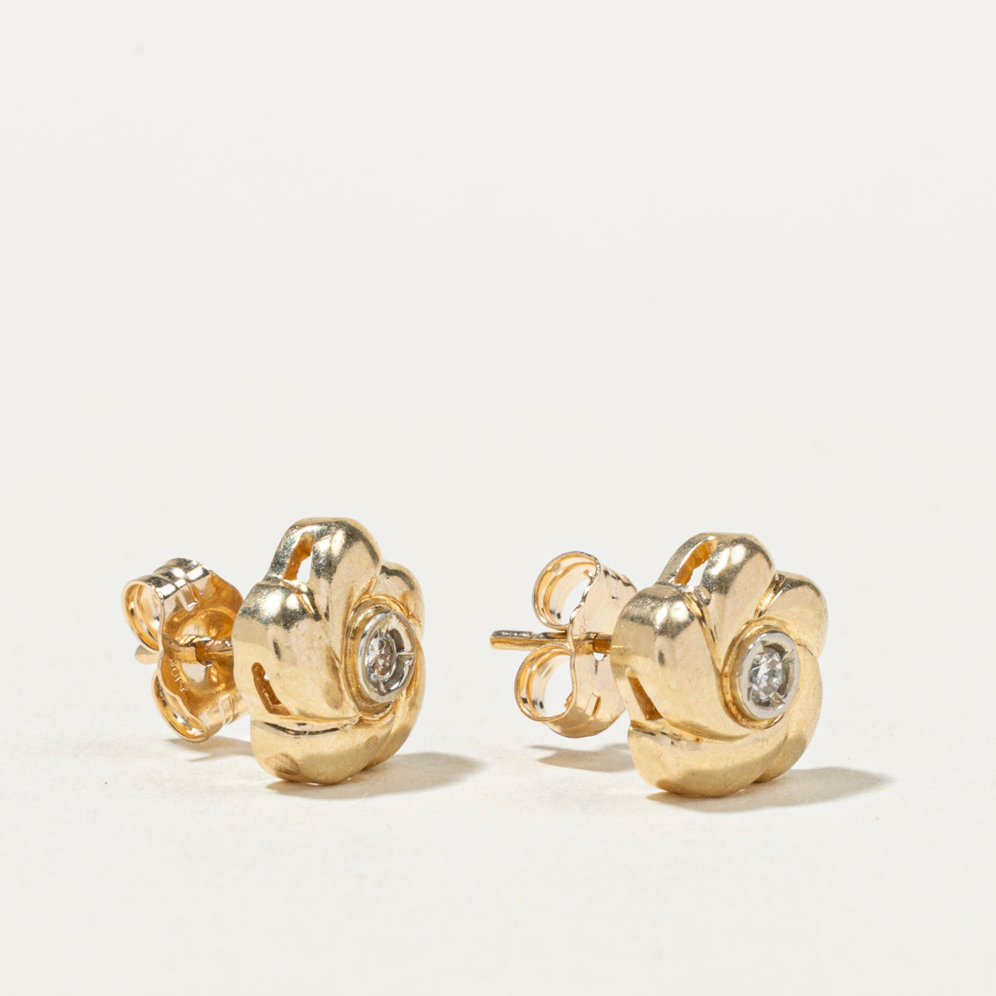 10K Diamond Flower Stud Earrings | 0.04ctw