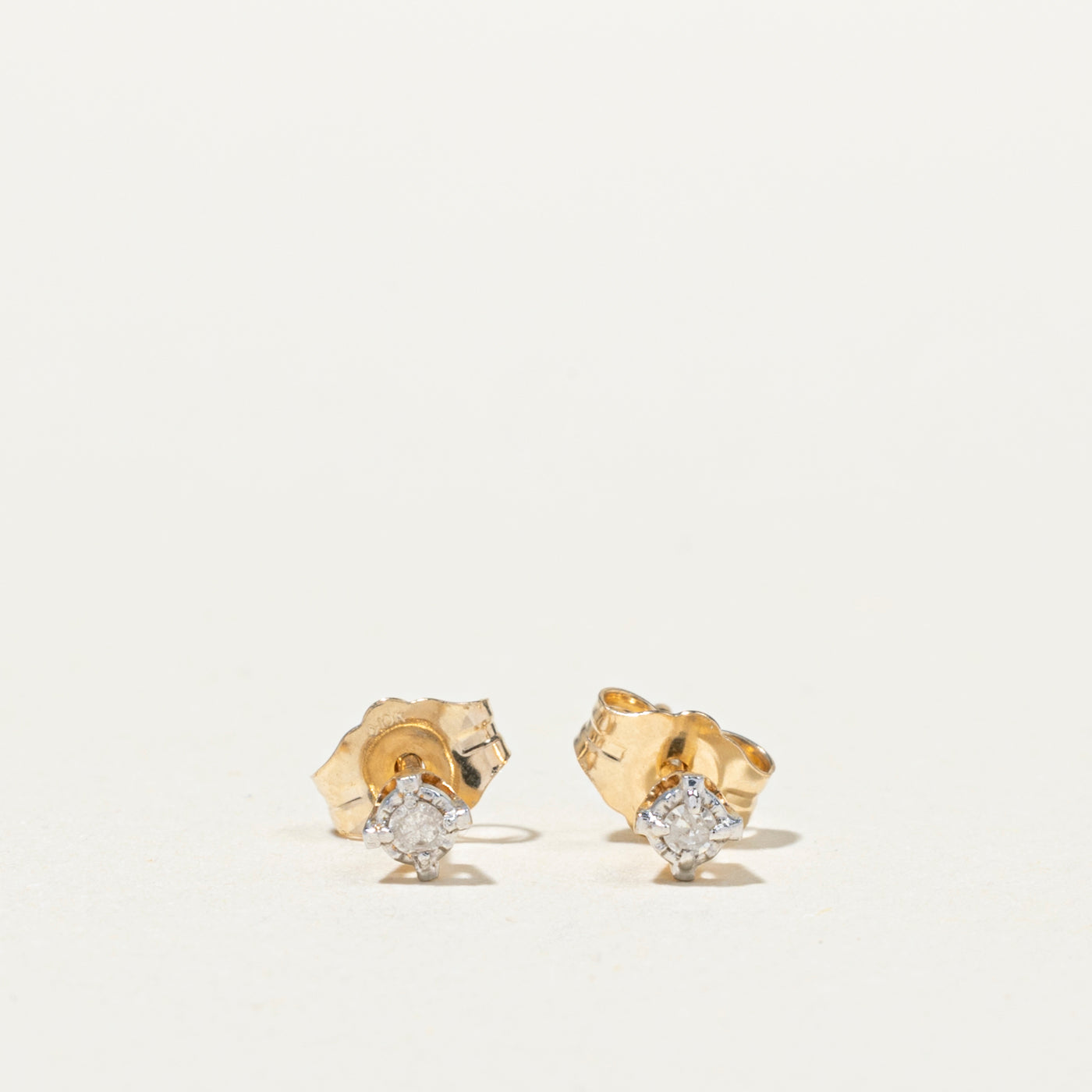 10K Illusion Set Diamond Petite Stud Earrings | 0.04ctw
