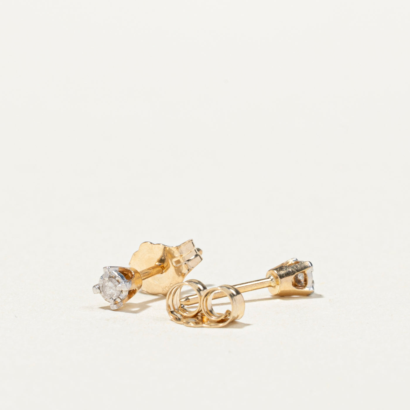 10K Illusion Set Diamond Petite Stud Earrings | 0.04ctw