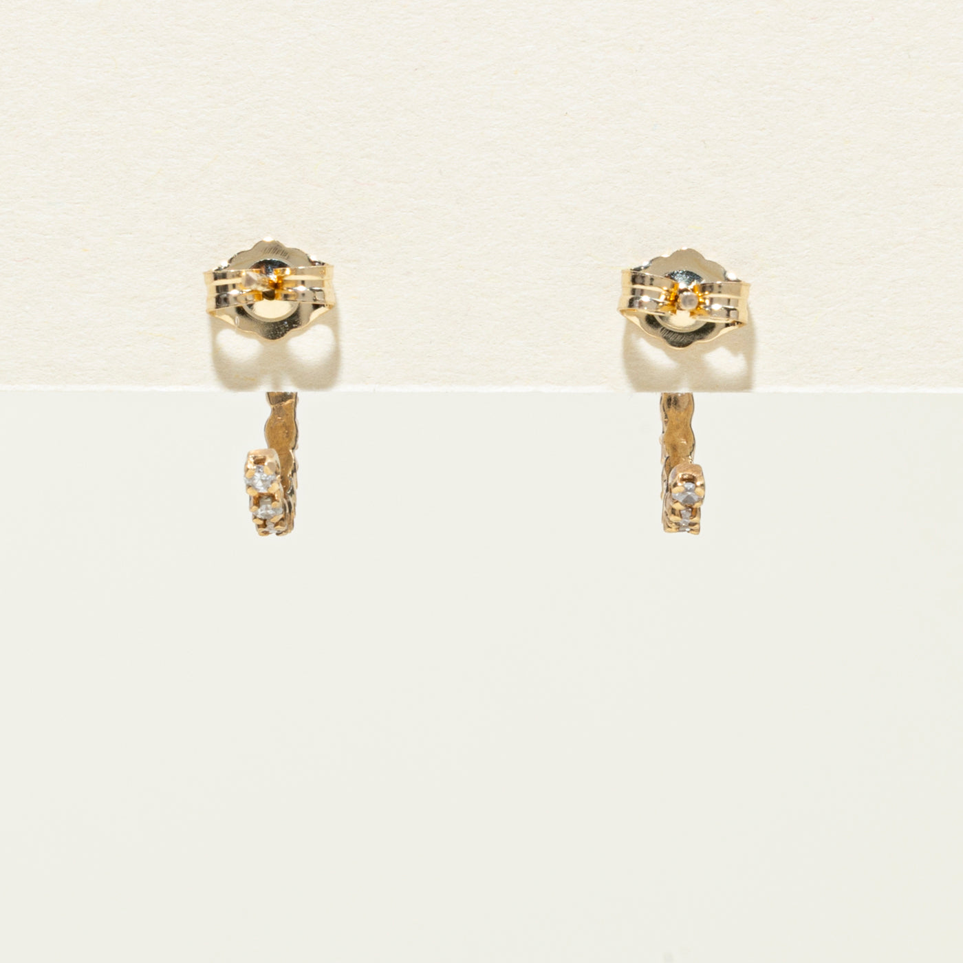 Boucles d'oreilles demi-huggie en or jaune 14 carats serties de diamants | 0,28 ct au total