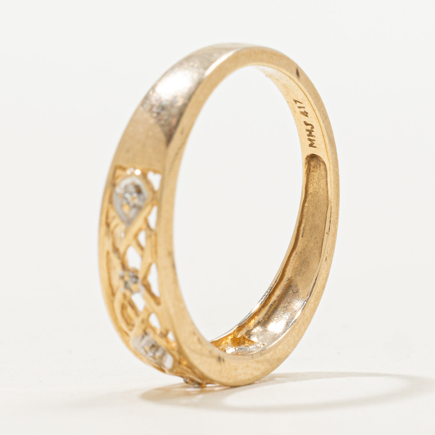 Bague tissée en or 10 carats sertie de trois diamants | Taille 6,75