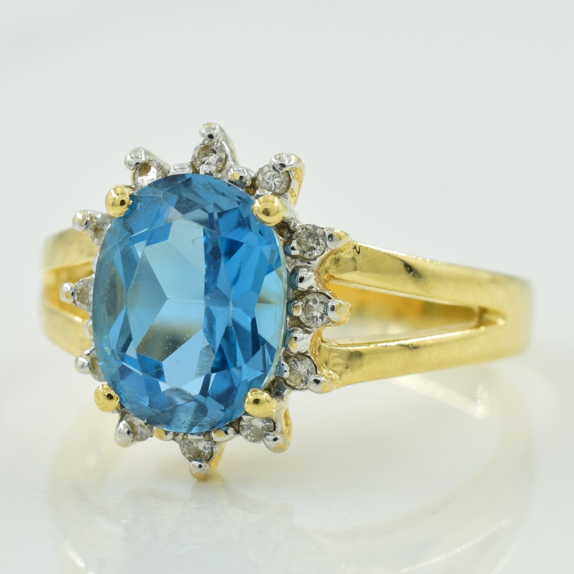 Blue Topaz & Diamond Halo Ring | 1.75ct, 0.08ctw | SZ 6.25 |