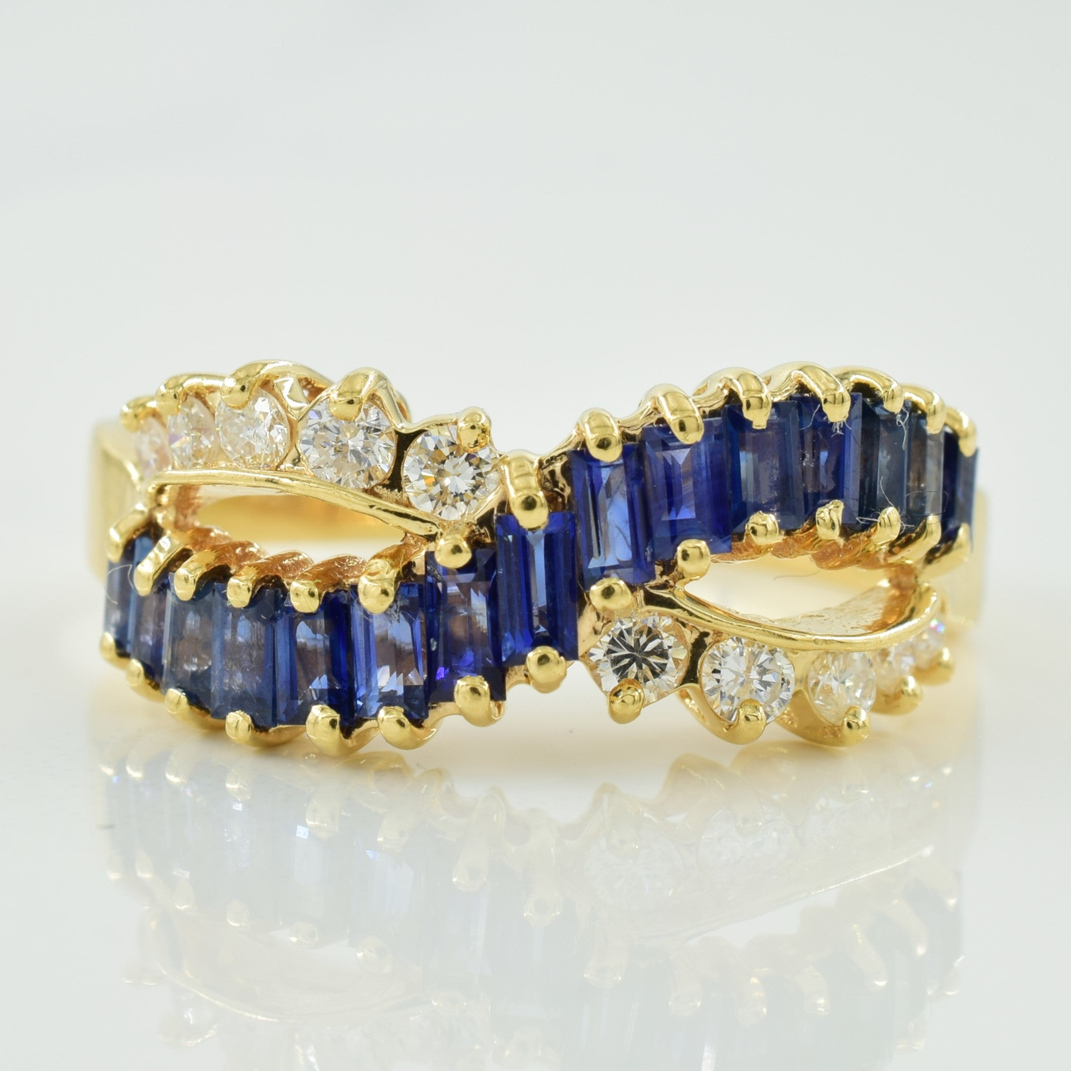 Bague croisée en saphir bleu et diamants | 1,00 ct, 0,30 ct | Taille 11 |
