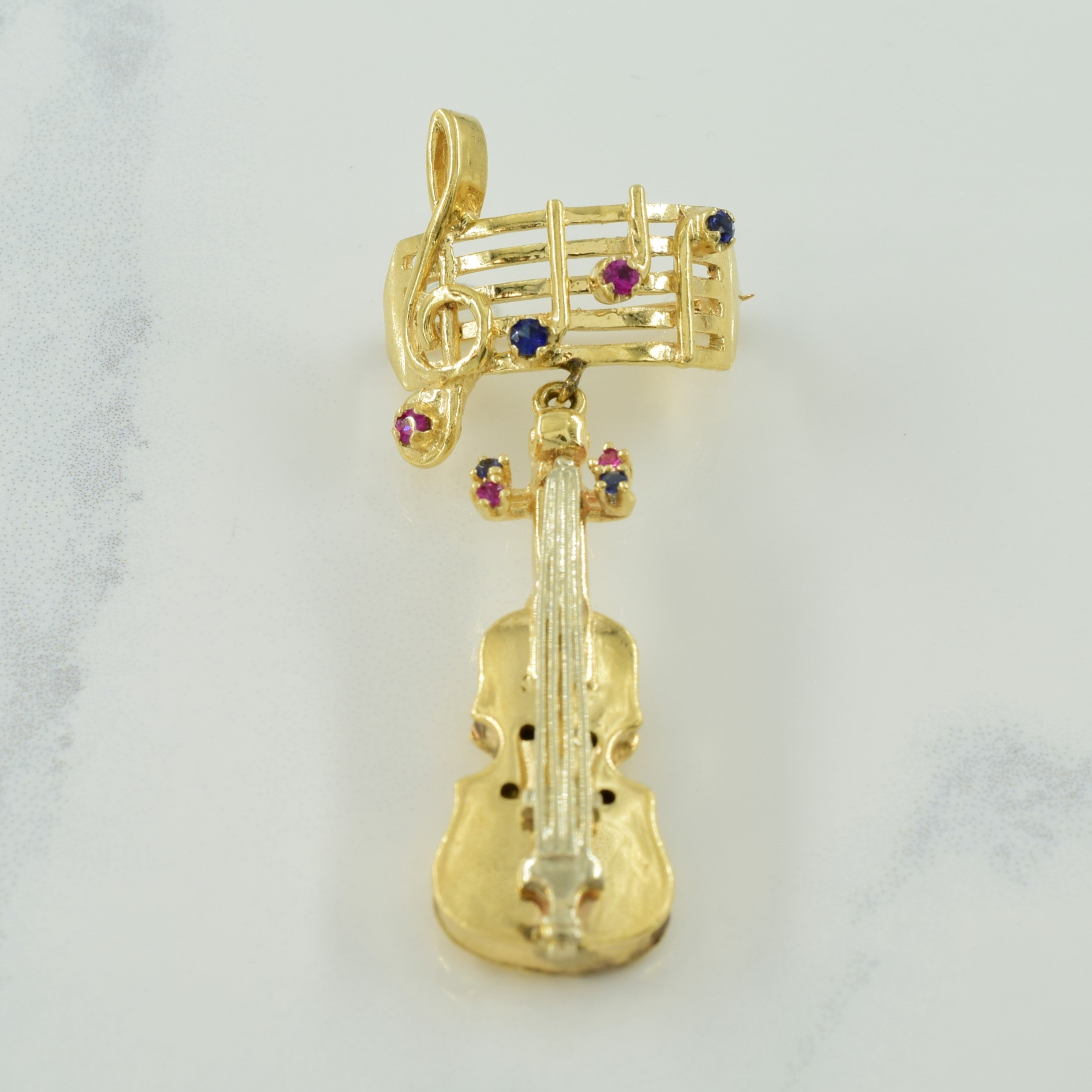 Synthetic Ruby & Sapphire Musical Staff & Violin Brooch | 0.30ctw |