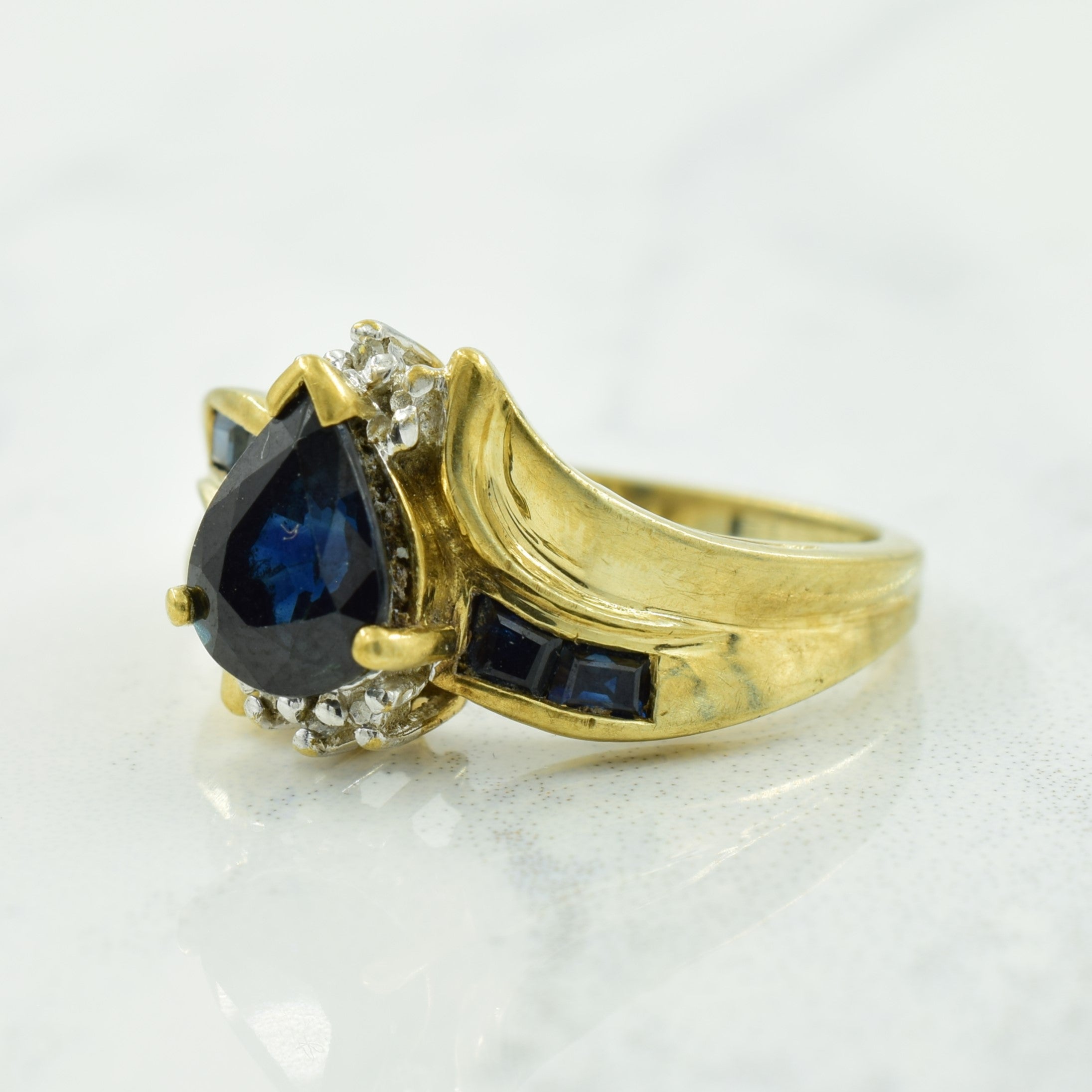 Blue Sapphire & Diamond Bypass Ring | 1.40ctw, 0.01ctw | SZ 6 |