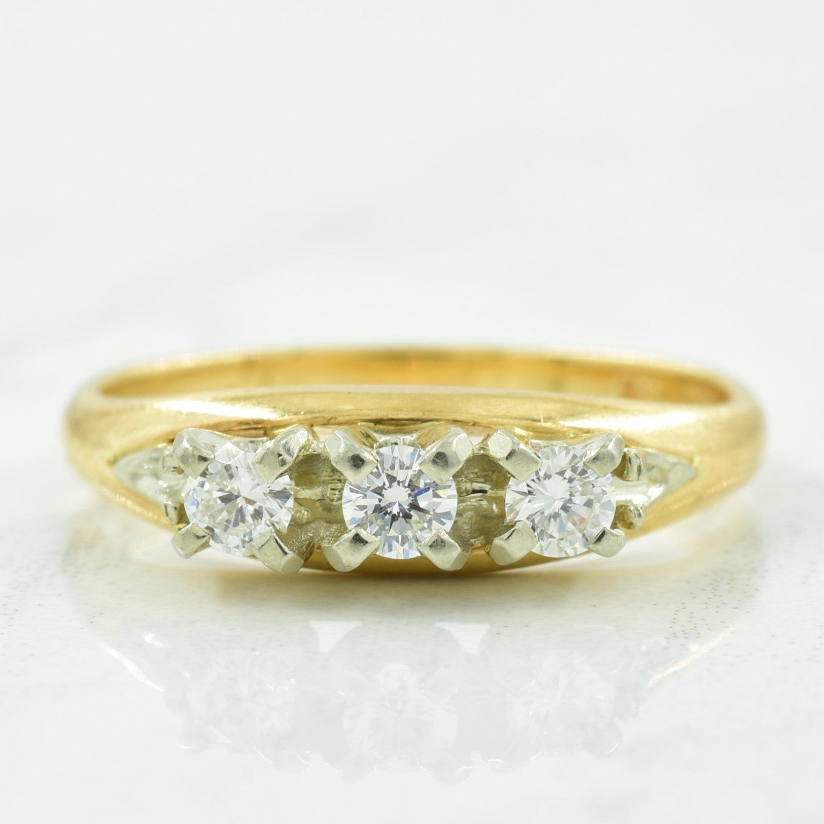 Three Stone Diamond Ring | 0.24ctw | SZ 6.5 |