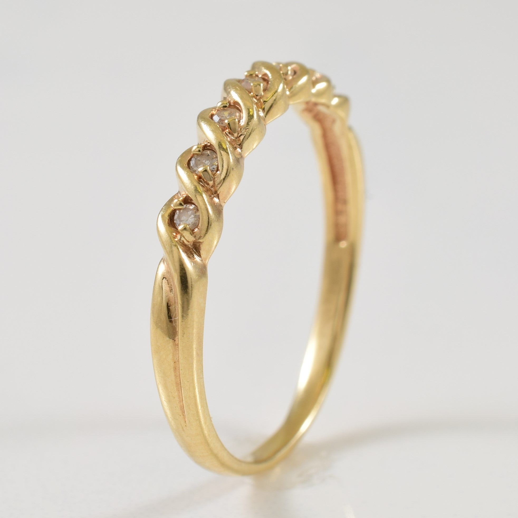 Serpentine Diamond Ring | 0.06ctw | SZ 7 |
