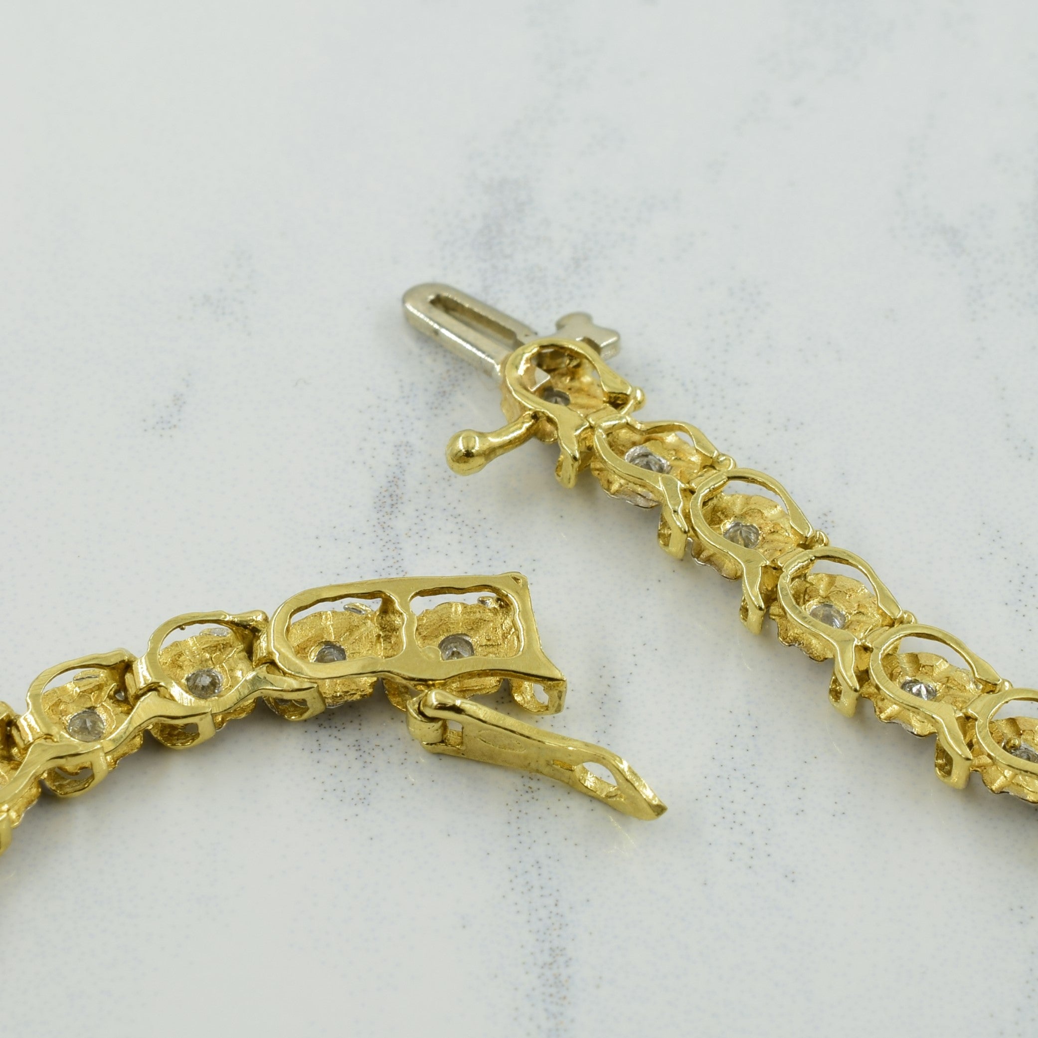 Bracelet de tennis en or bicolore 10 carats avec diamants | 0,88 ct | 17,8 cm |