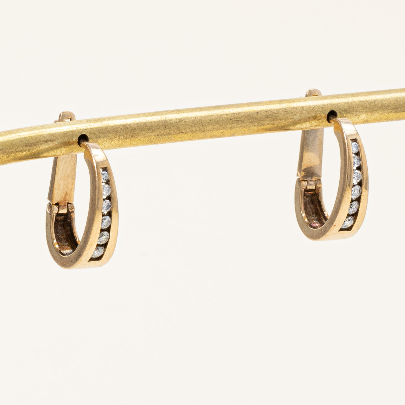 Channel Set Diamond Oval Huggie Earrings | 0.23ctw |