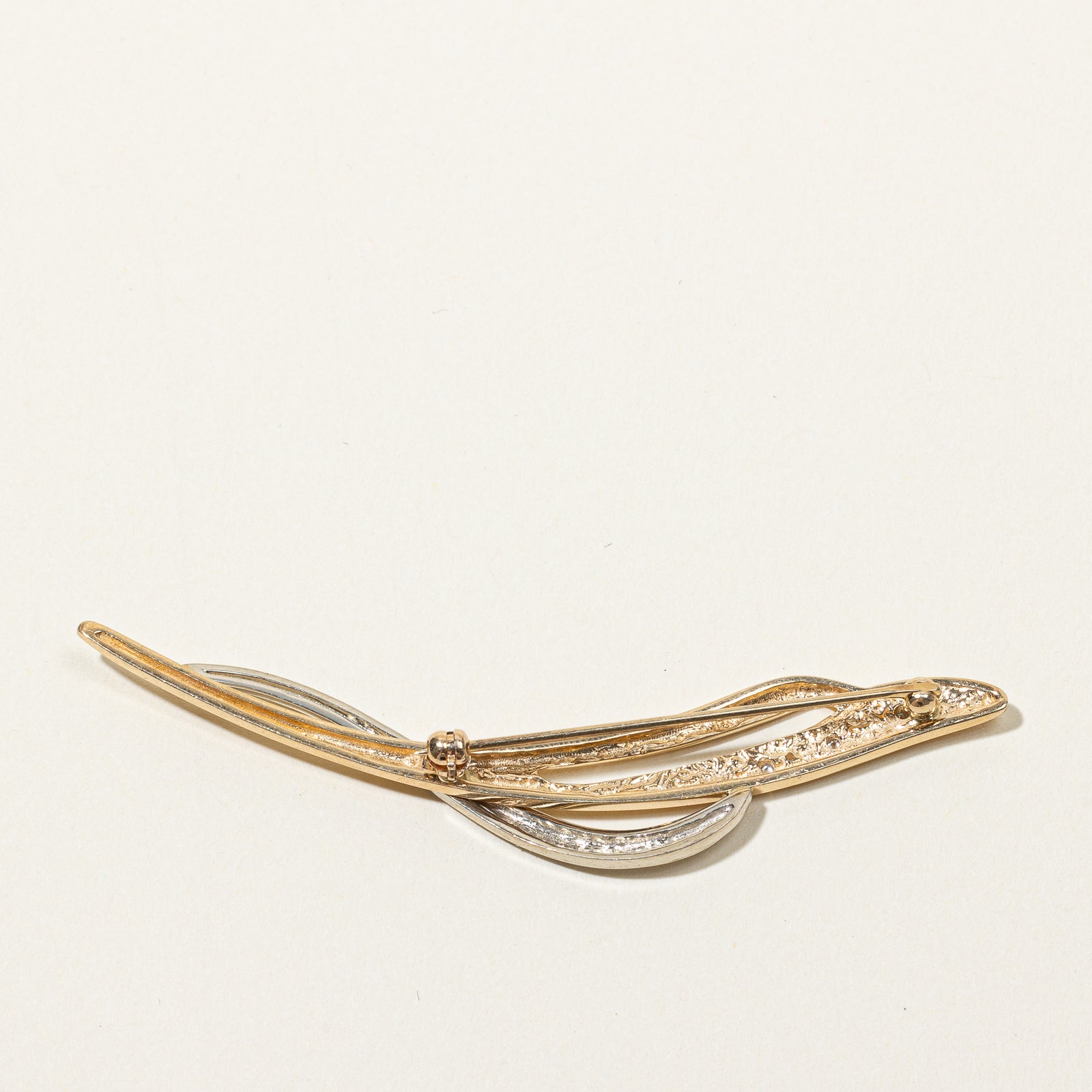 Abstract Two Tone Diamond Brooch | 0.03 |