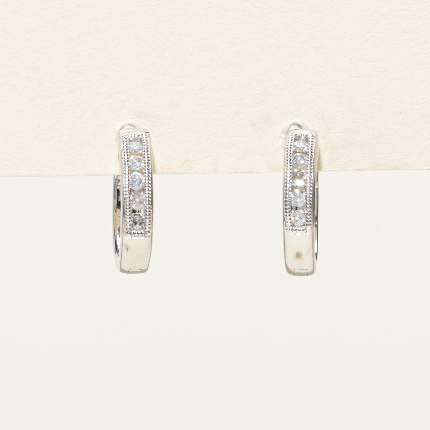 14K Channel Set Diamond Huggie Earrings | 0.10ctw