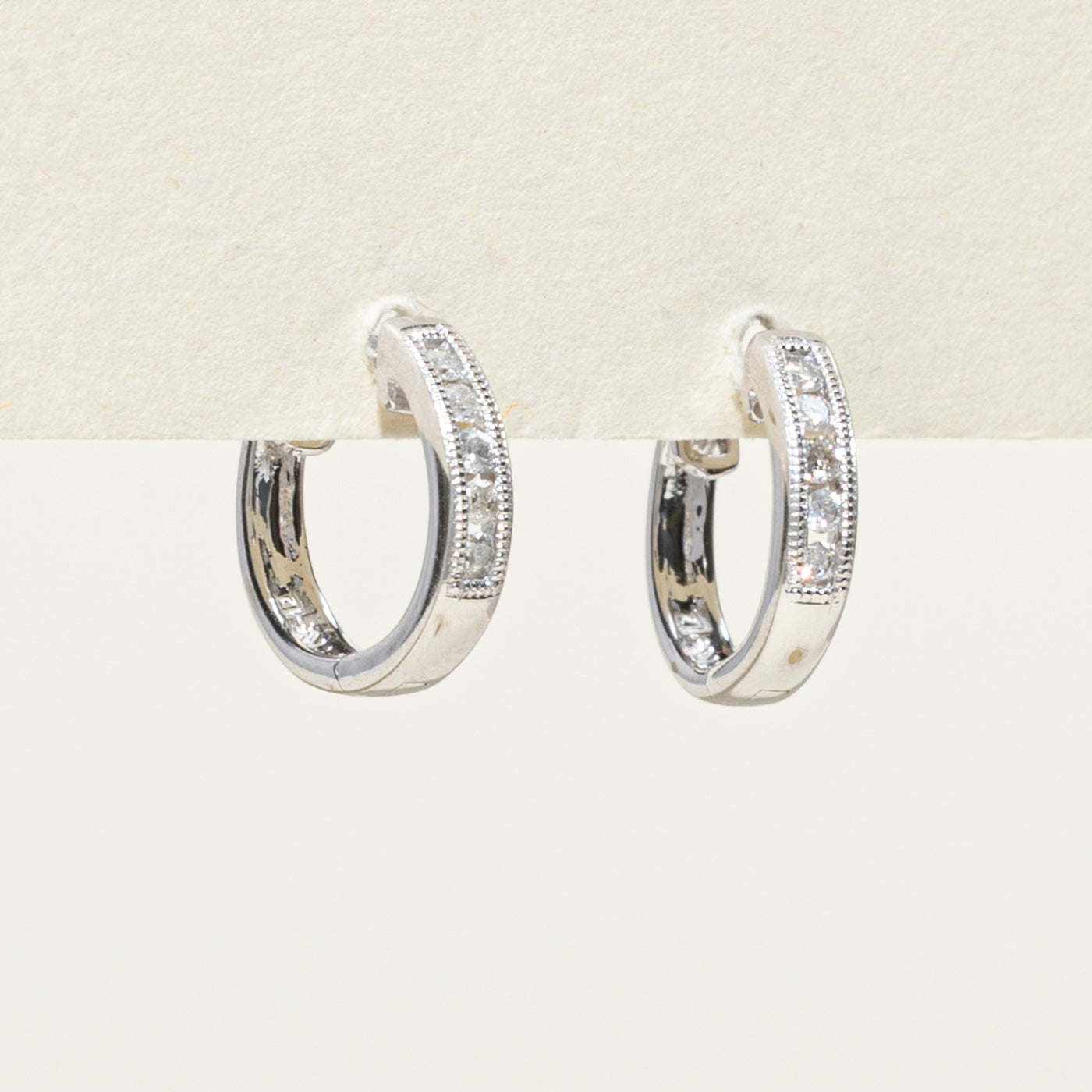 14K Channel Set Diamond Huggie Earrings | 0.10ctw