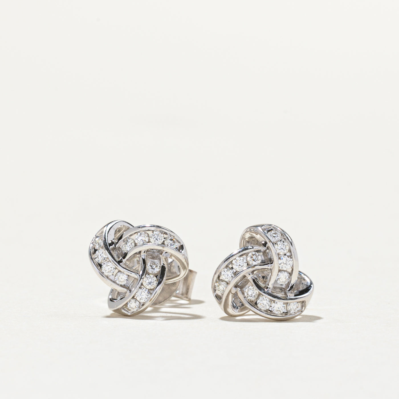 14K Diamond Interlocking Design Stud Earrings | 0.14ctw
