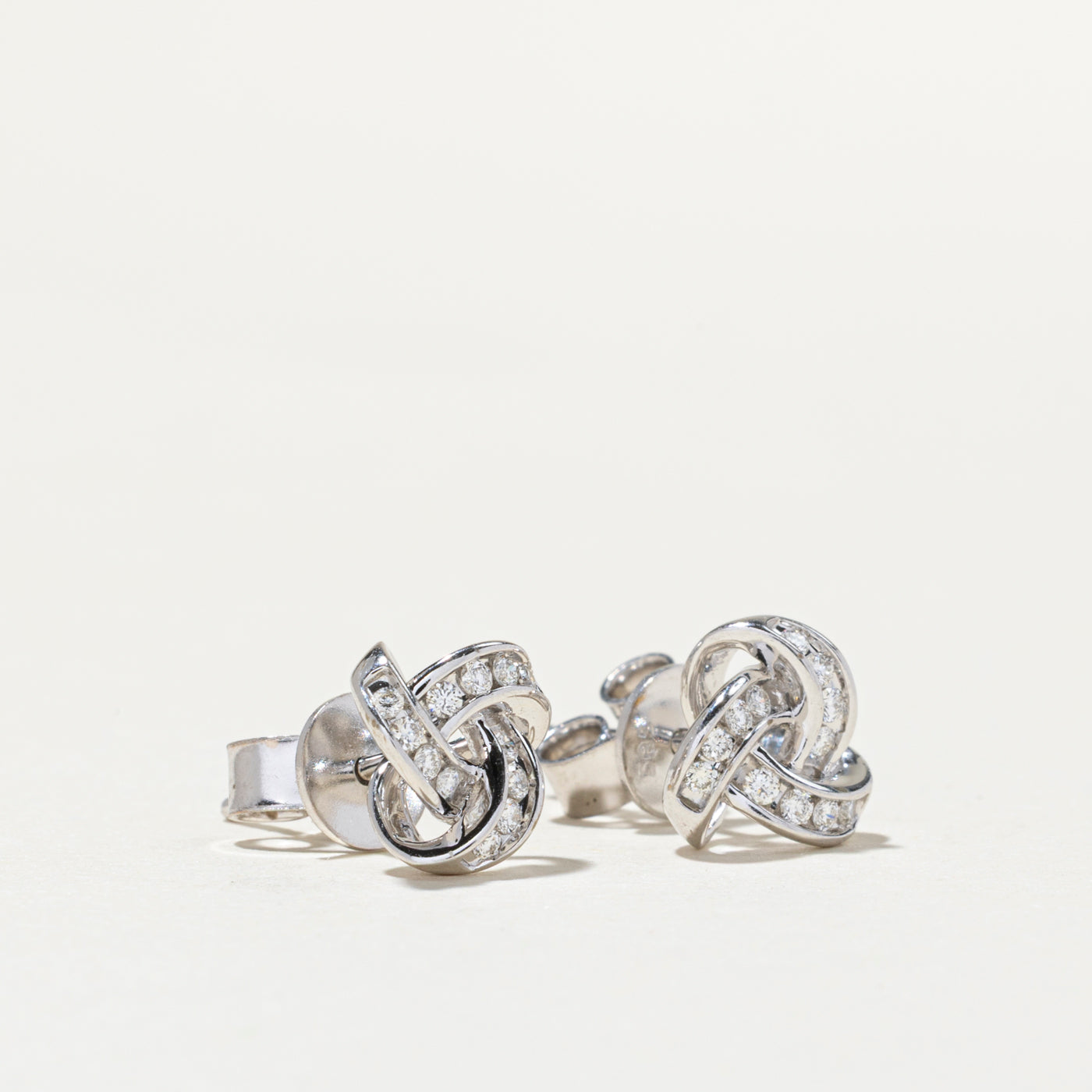 14K Diamond Interlocking Design Stud Earrings | 0.14ctw
