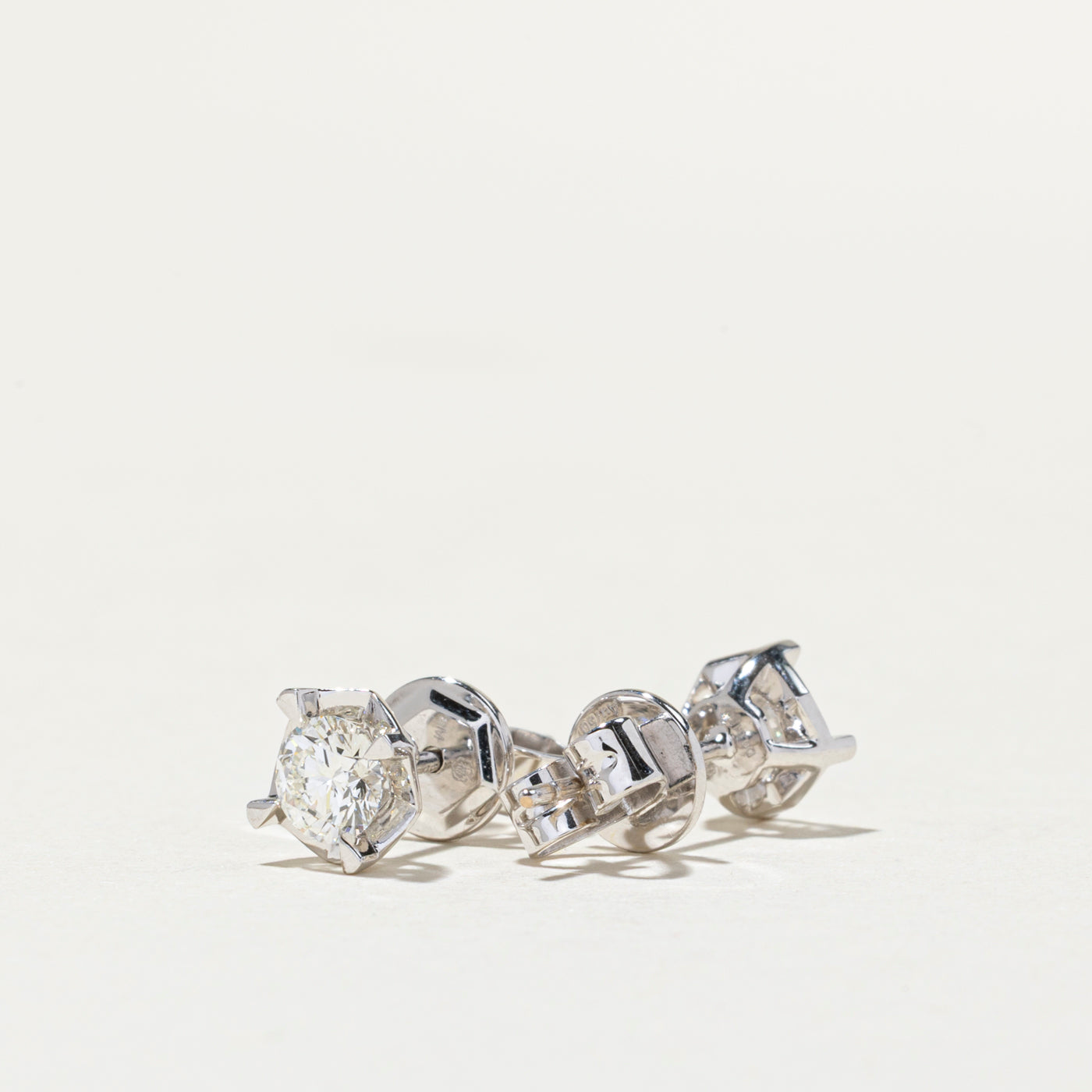 18K Basket Set Diamond Stud Earrings | 0.64ctw