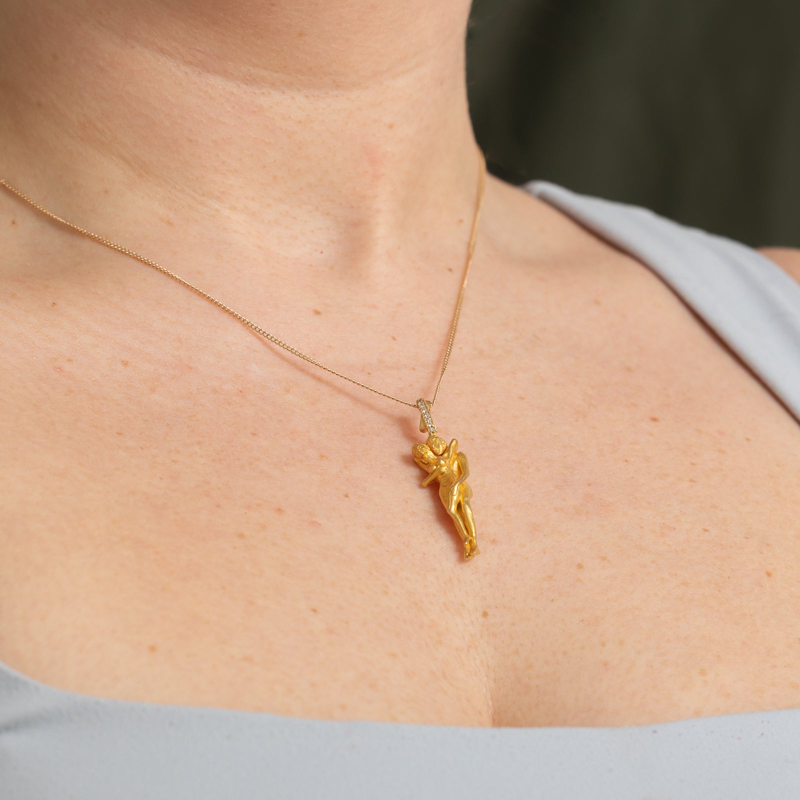 Diamond Embraced Couple Pendant | 0.04ctw