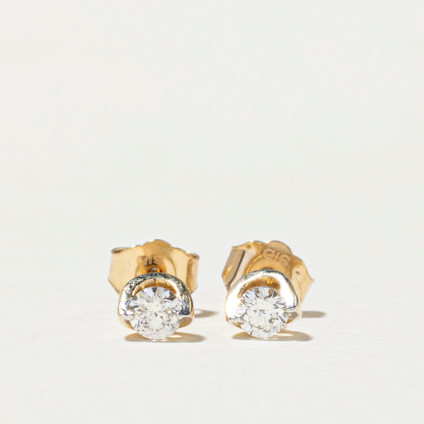 Solitaire Diamond Stud Earrings | 0.63ctw