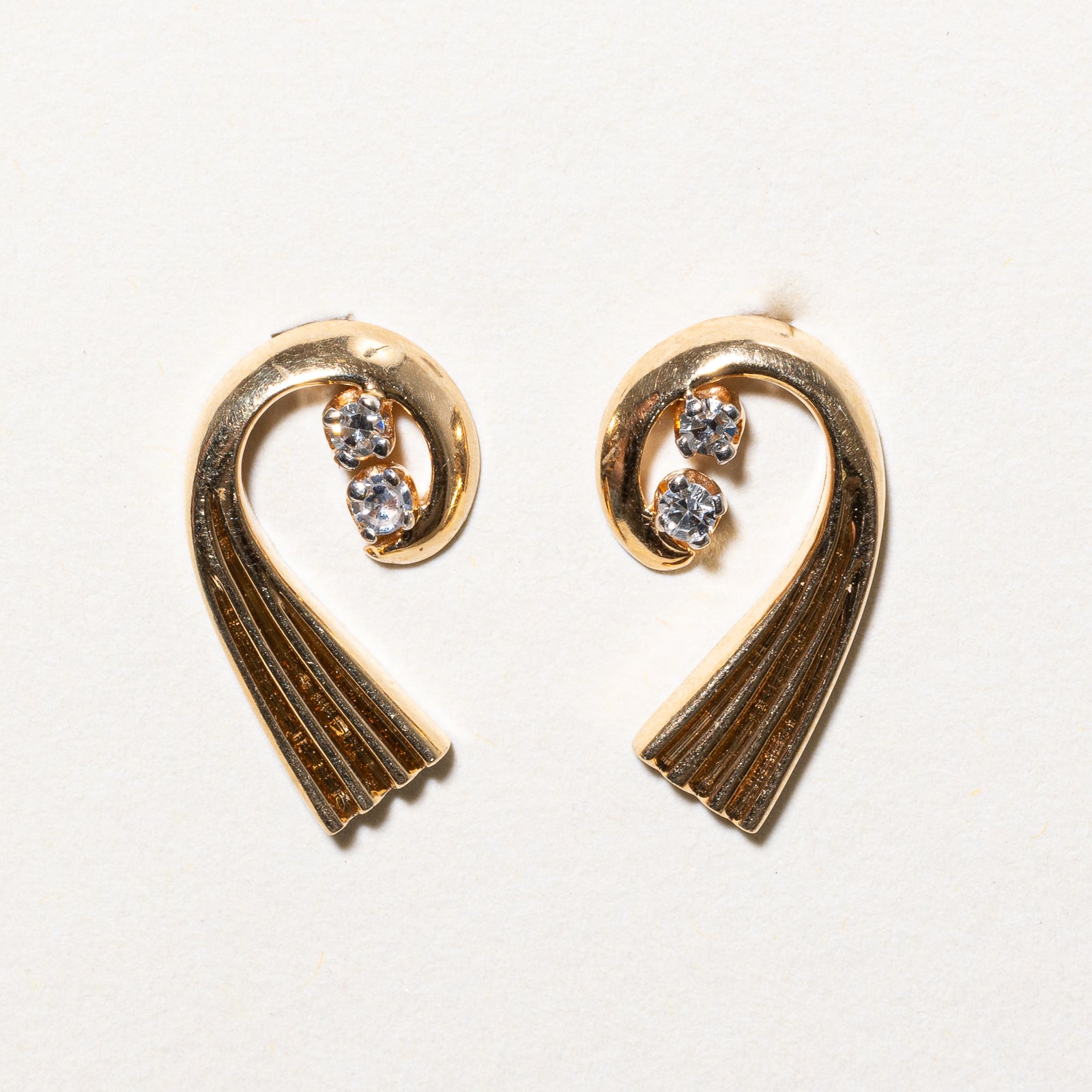 14K Diamond Swirl Stud Earrings | 0.12ctw