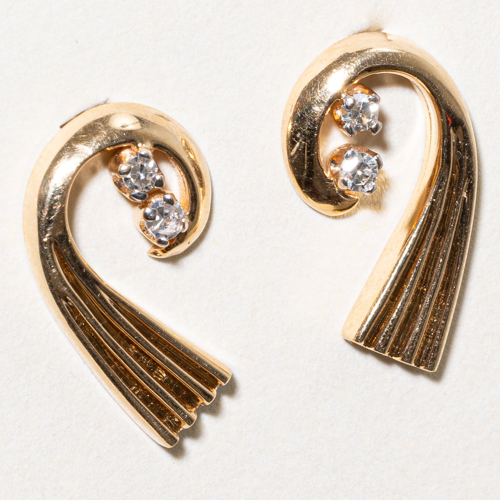 14K Diamond Swirl Stud Earrings | 0.12ctw