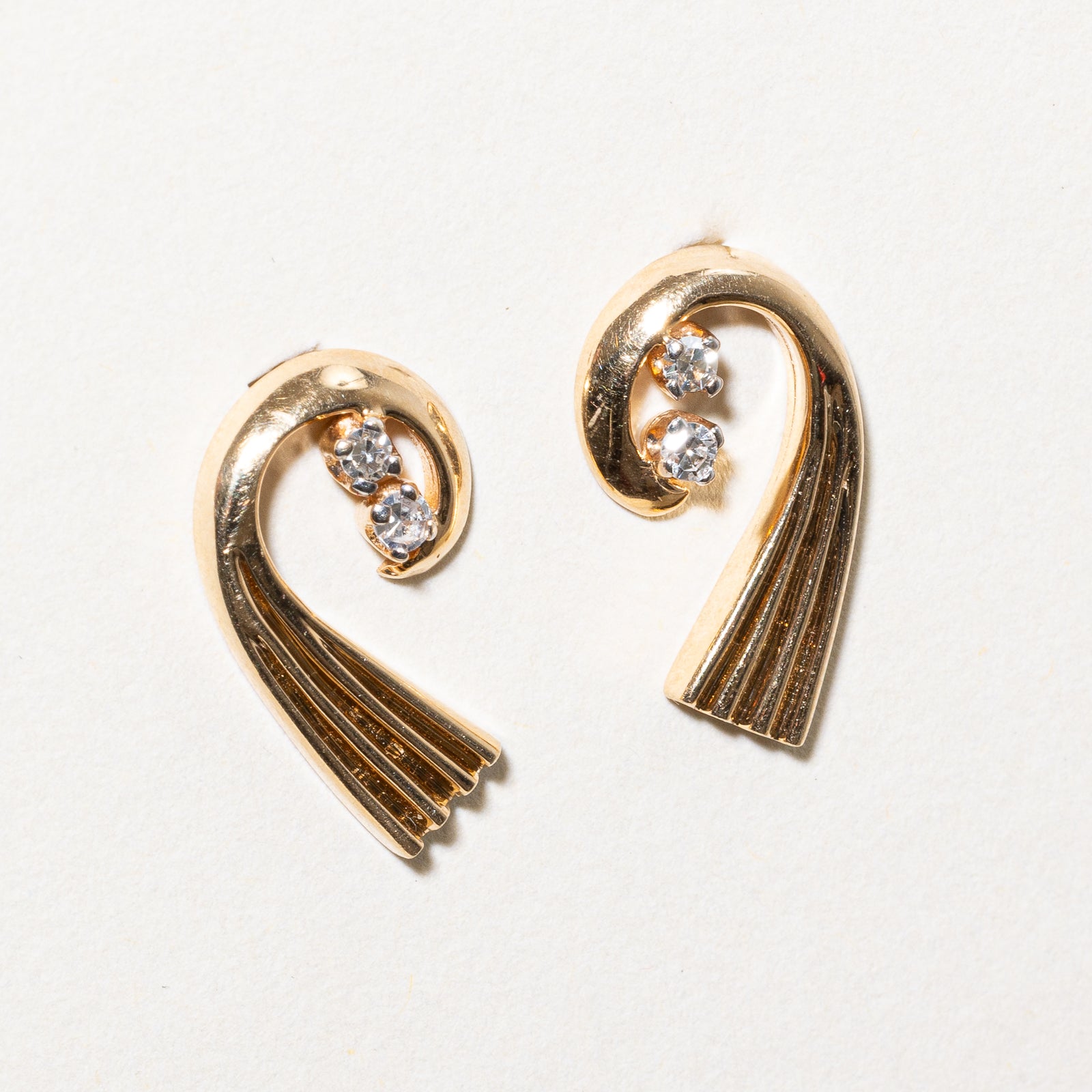 14K Diamond Swirl Stud Earrings | 0.12ctw