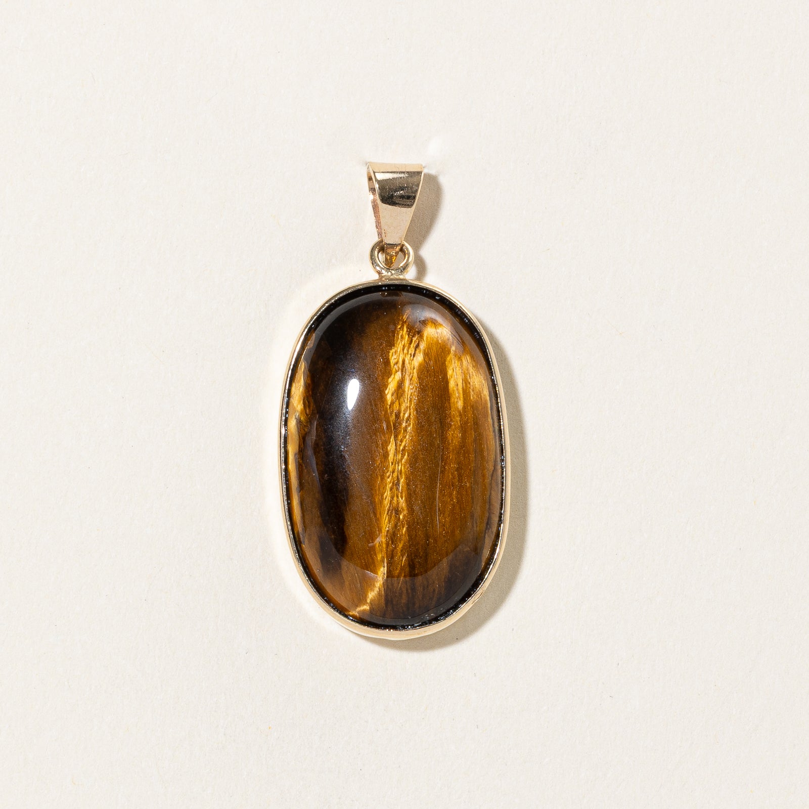 Bezel Set Oval Cabochon Tiger's Eye Pendant | 34.00ct