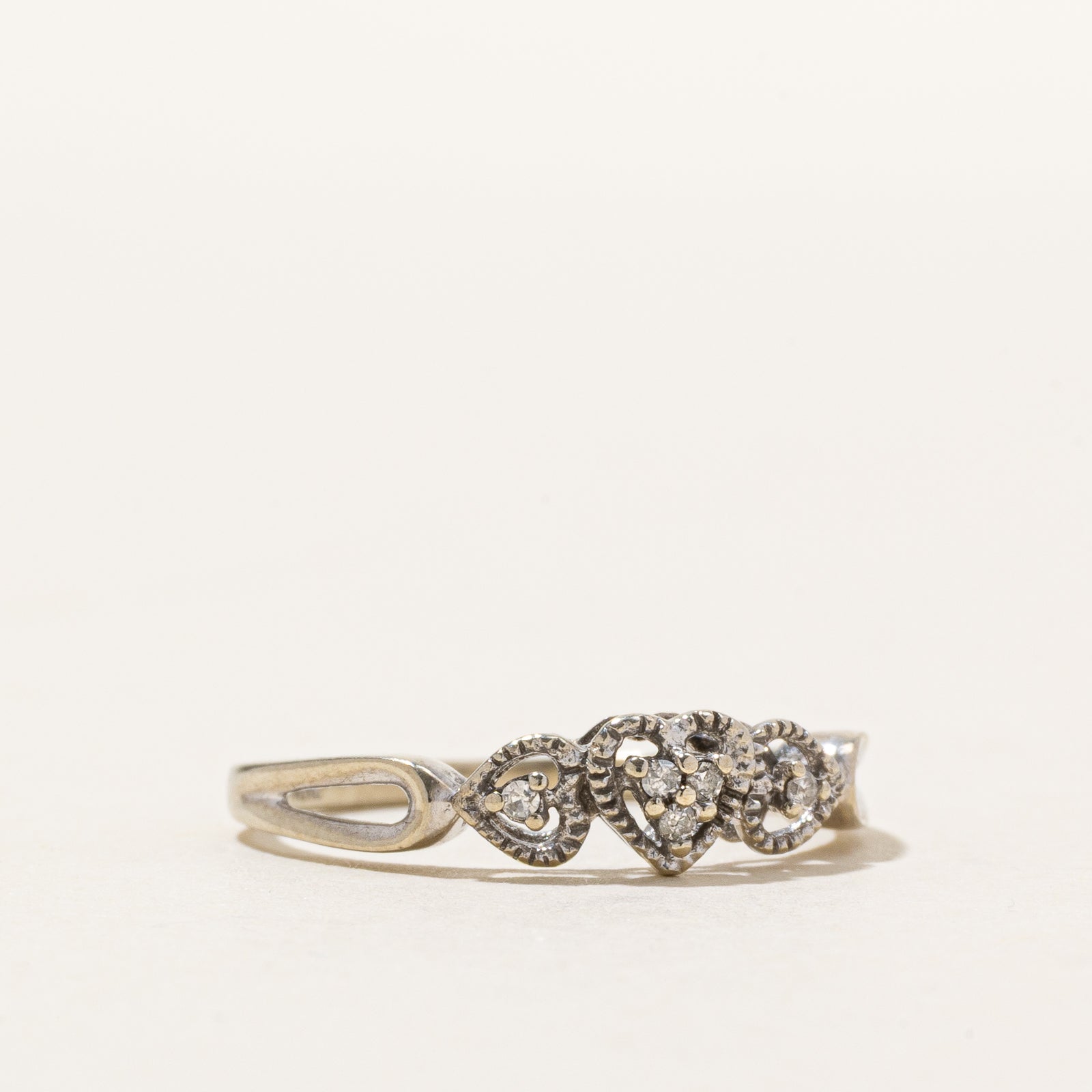 10K Diamond Three Open Heart Ring | 0.04ctw | SZ 6.75