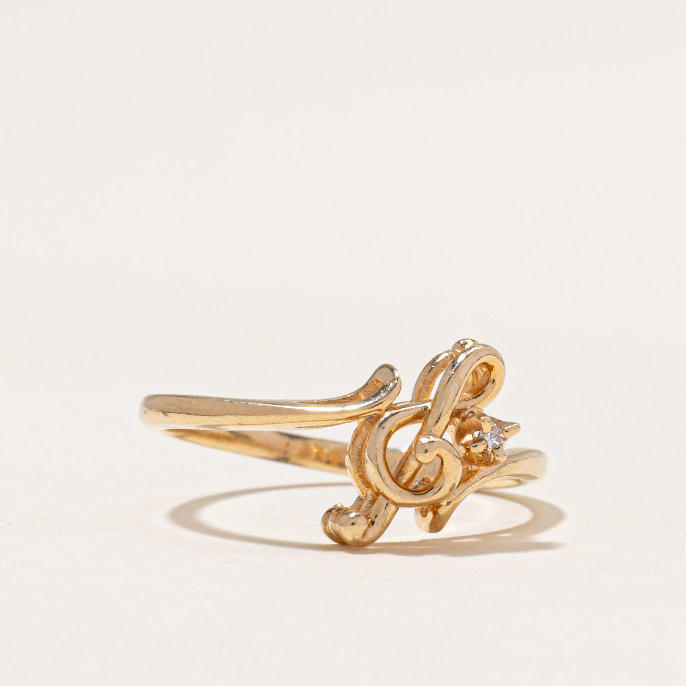 Bague en forme de clé de sol avec un diamant unique | 0,01 ct | Taille 4,75