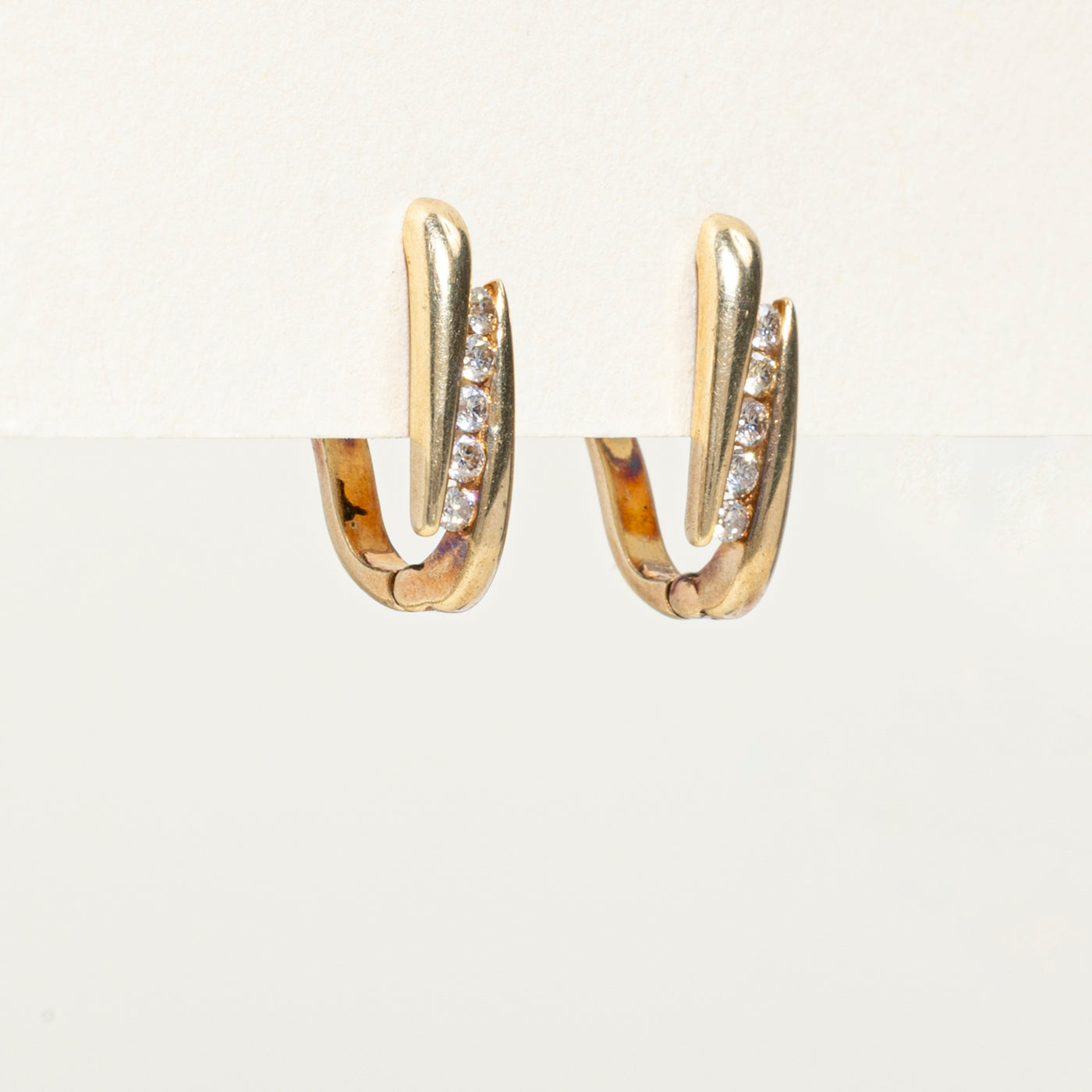 Diagonal Channel Set Diamond Huggie Earrings | 0.26ctw