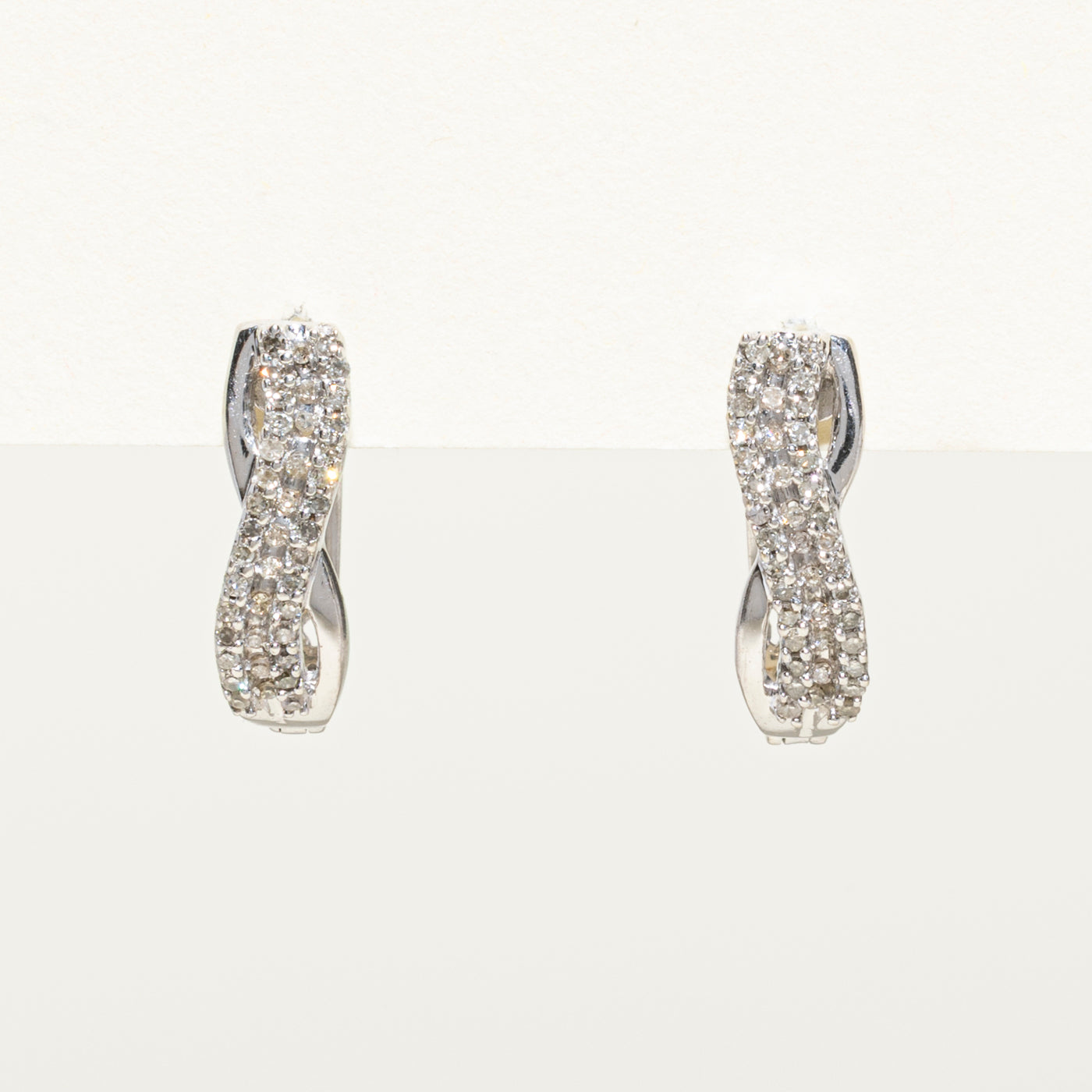 Diamond Cross Over Huggie Earrings | 0.20ctw