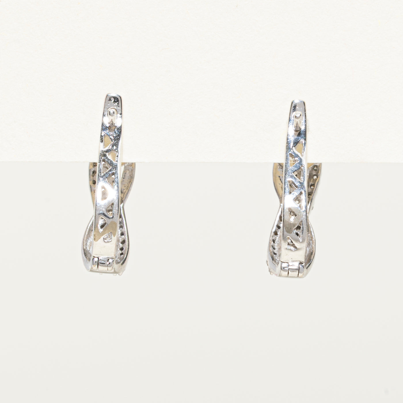 Diamond Cross Over Huggie Earrings | 0.20ctw