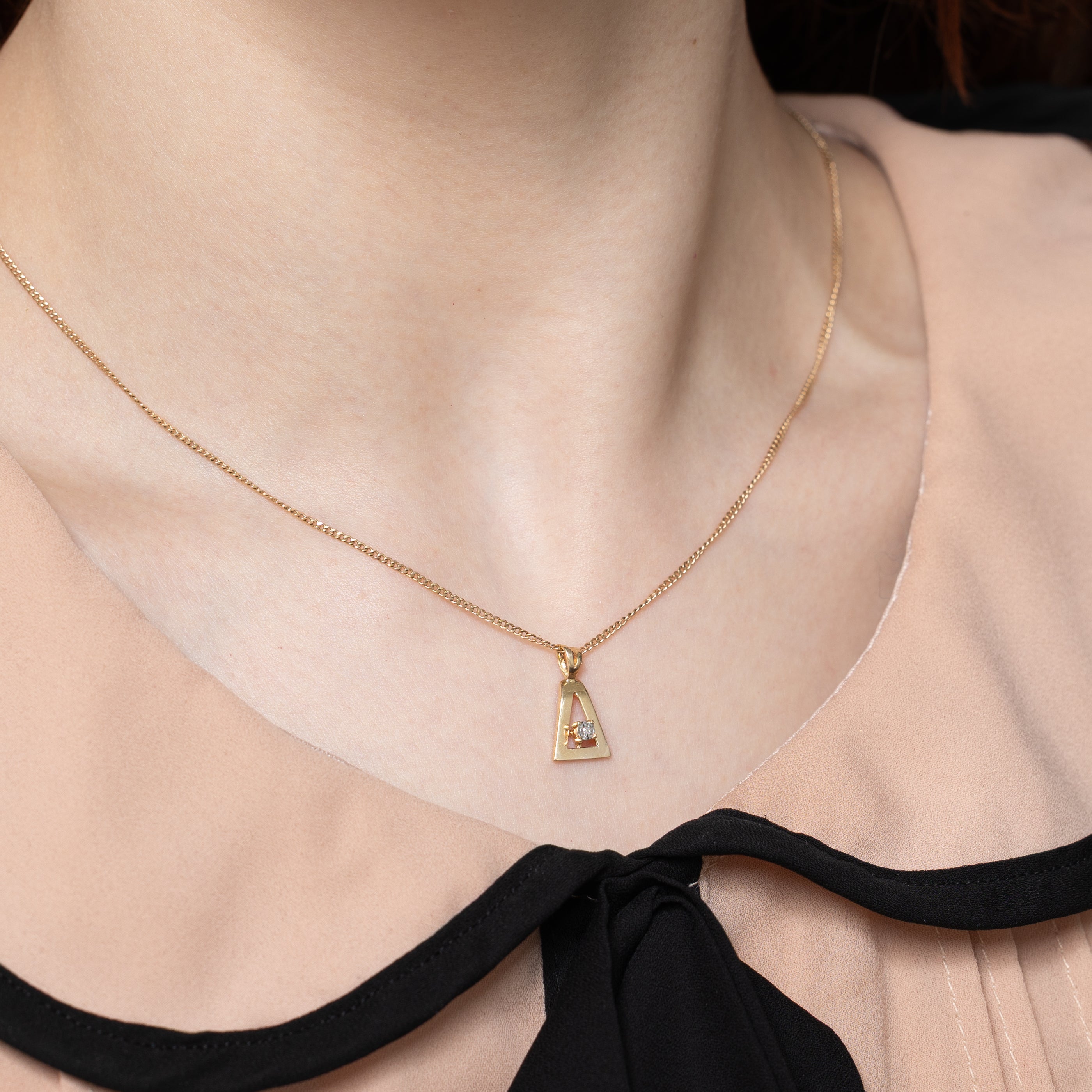 Single Diamond Triangle Pendant | 0.005ct